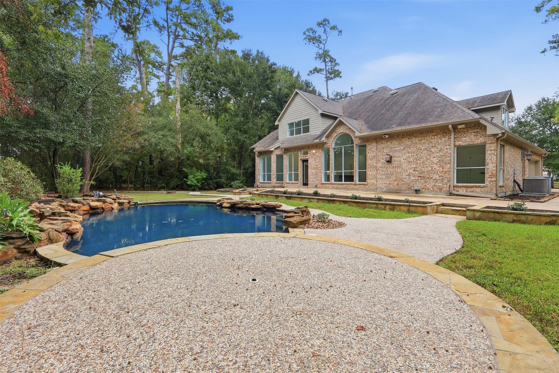 Plenty of flexible options for relaxing or entertaining in this backyard.