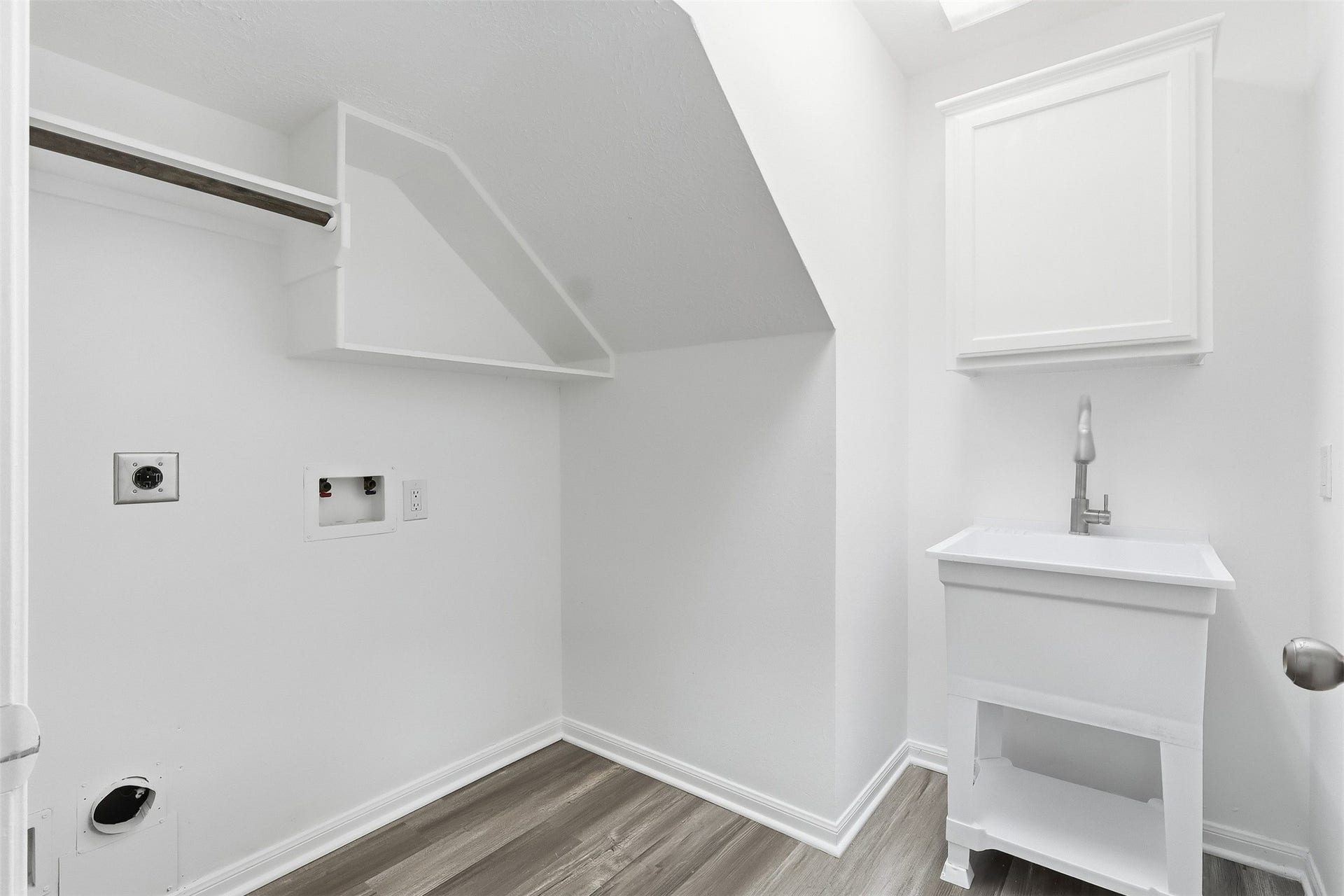 Laundry Room with utility sink.