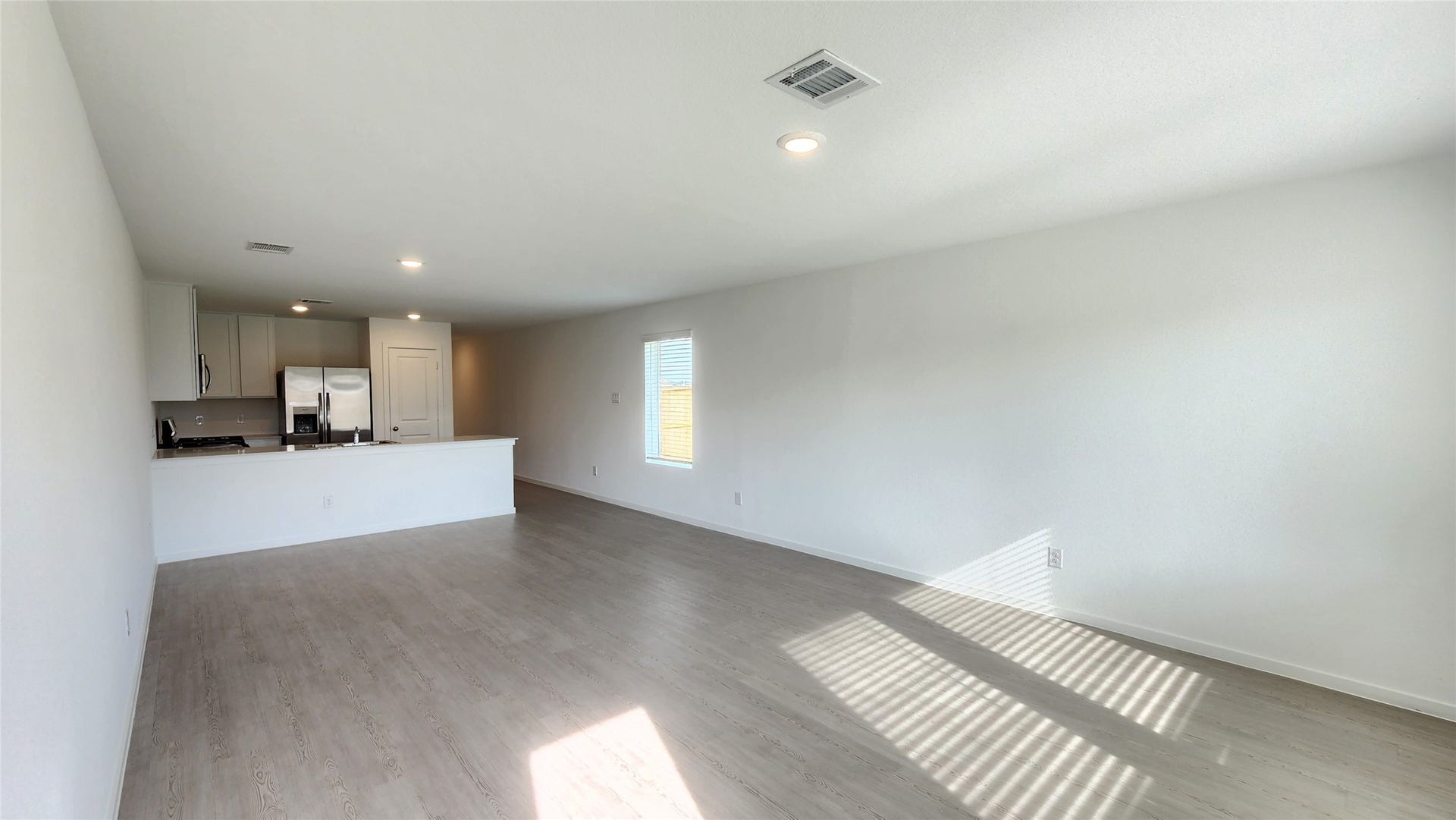 6303 Geyser Starish Drive, Katy, TX 77493 Family room to dining