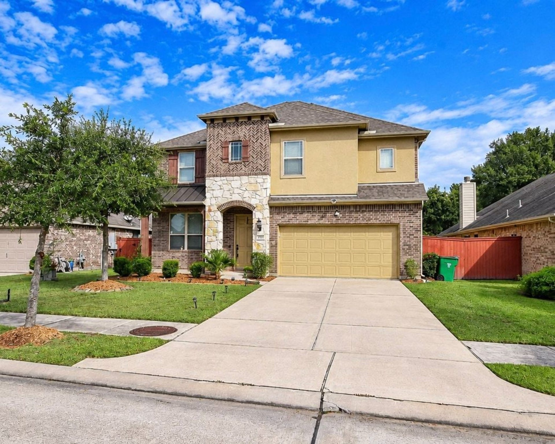 2 car garage and wide driveway for ample parking