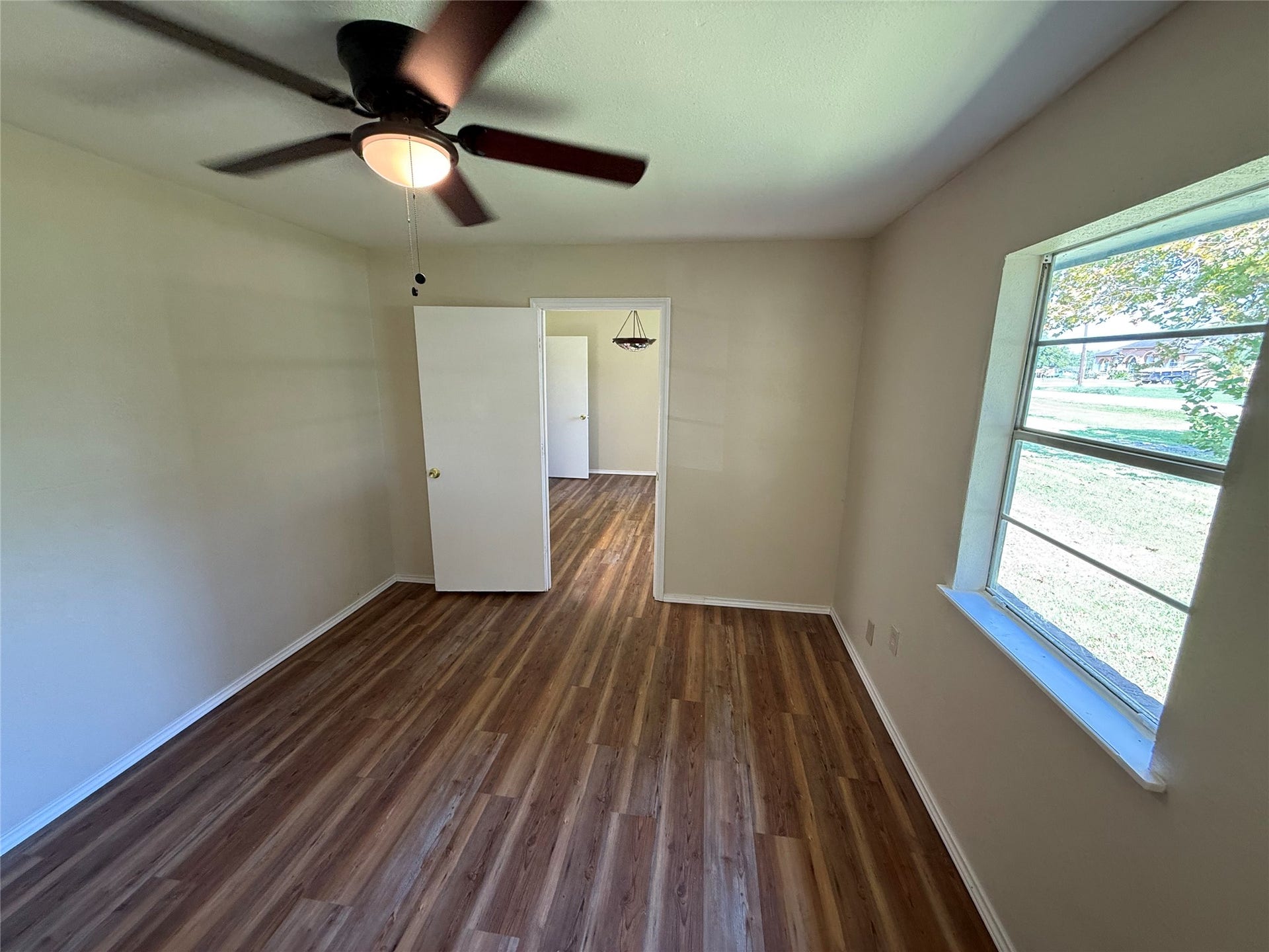 2524 Shouse Road, Santa Fe, TX 77510 Alternate view of the room showing natural light and access to the adjoining interior.