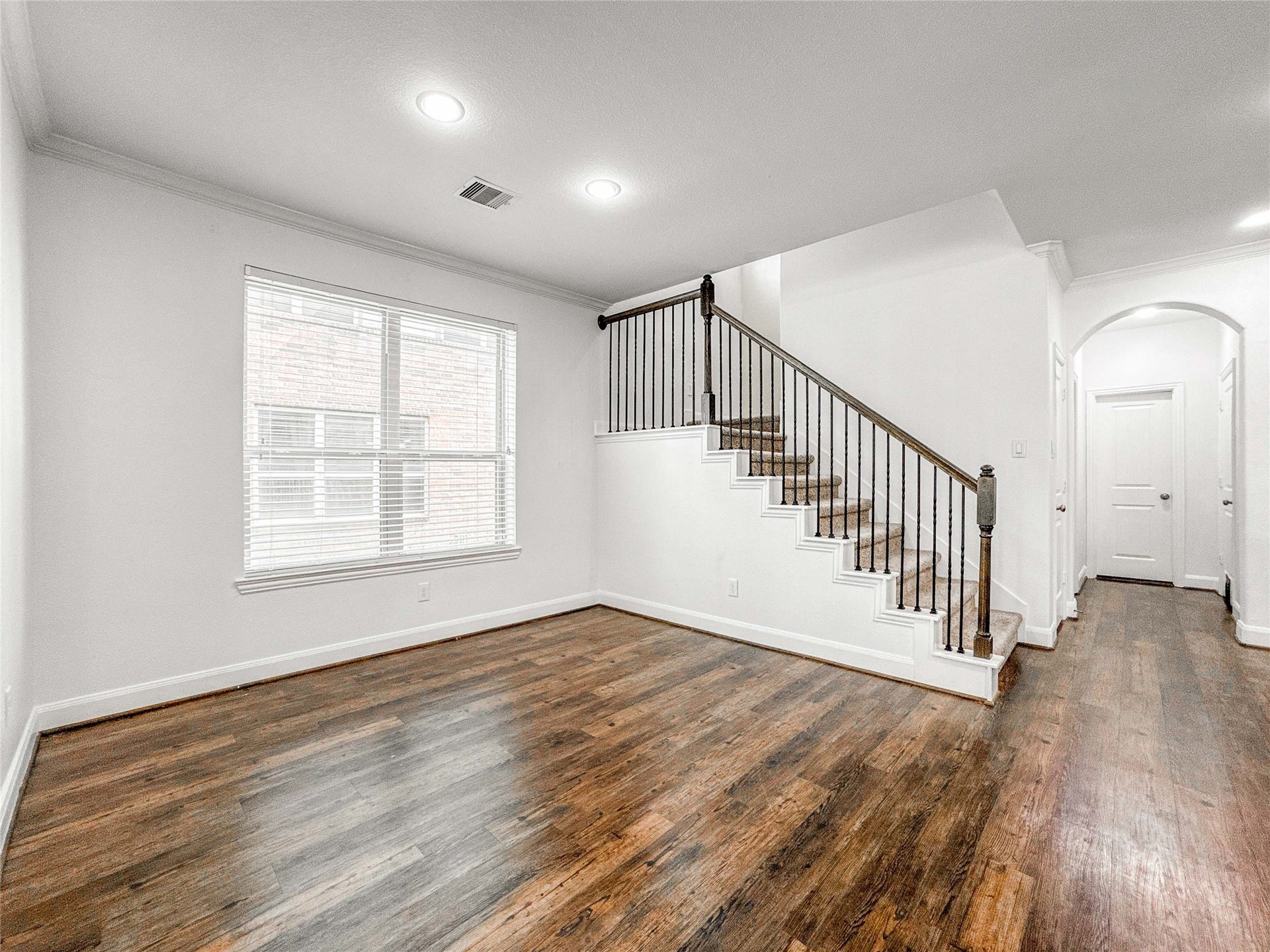 Cozy breakfast nook bathed in natural light, perfectly nestled within a spacious open floorplanideal for morning coffee or casual meals.