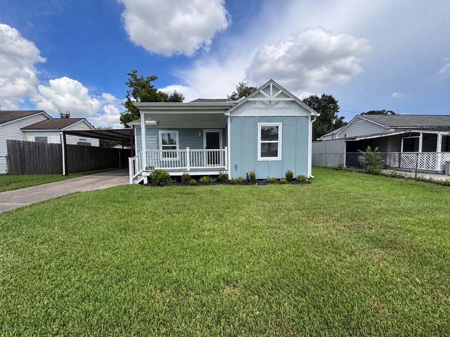 7619 Joplin Street, Houston, TX 77087 Completely remodeled from the foundation up, this charming single-story home features blue siding with crisp white trim, a welcoming front porch, and a spacious yard. The extensive renovation includes new sheetrock, updated finishes, and a custom kitchen, with the detached garage also fully remodeled.