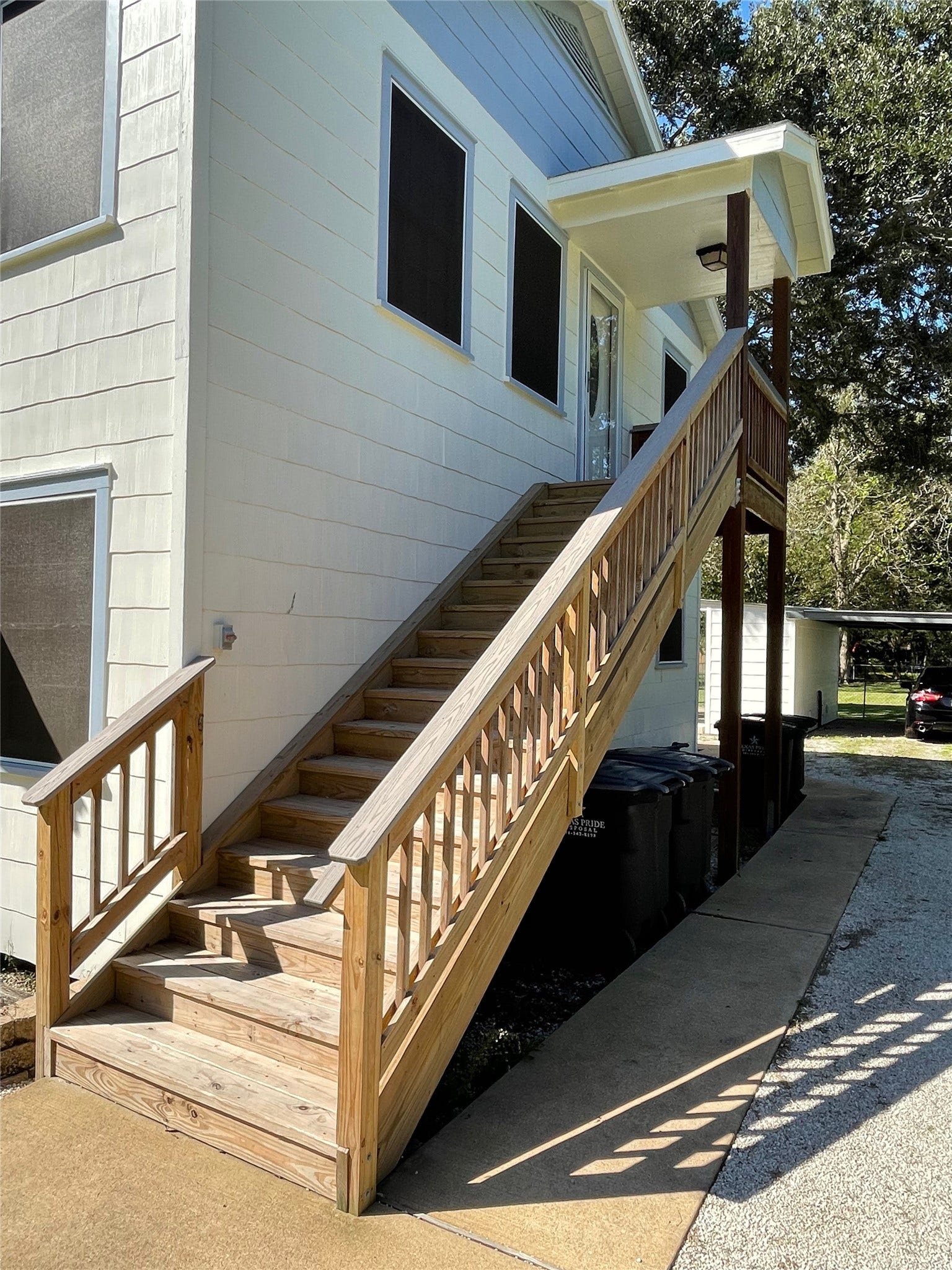 Stairway to Unit B is extra wide.