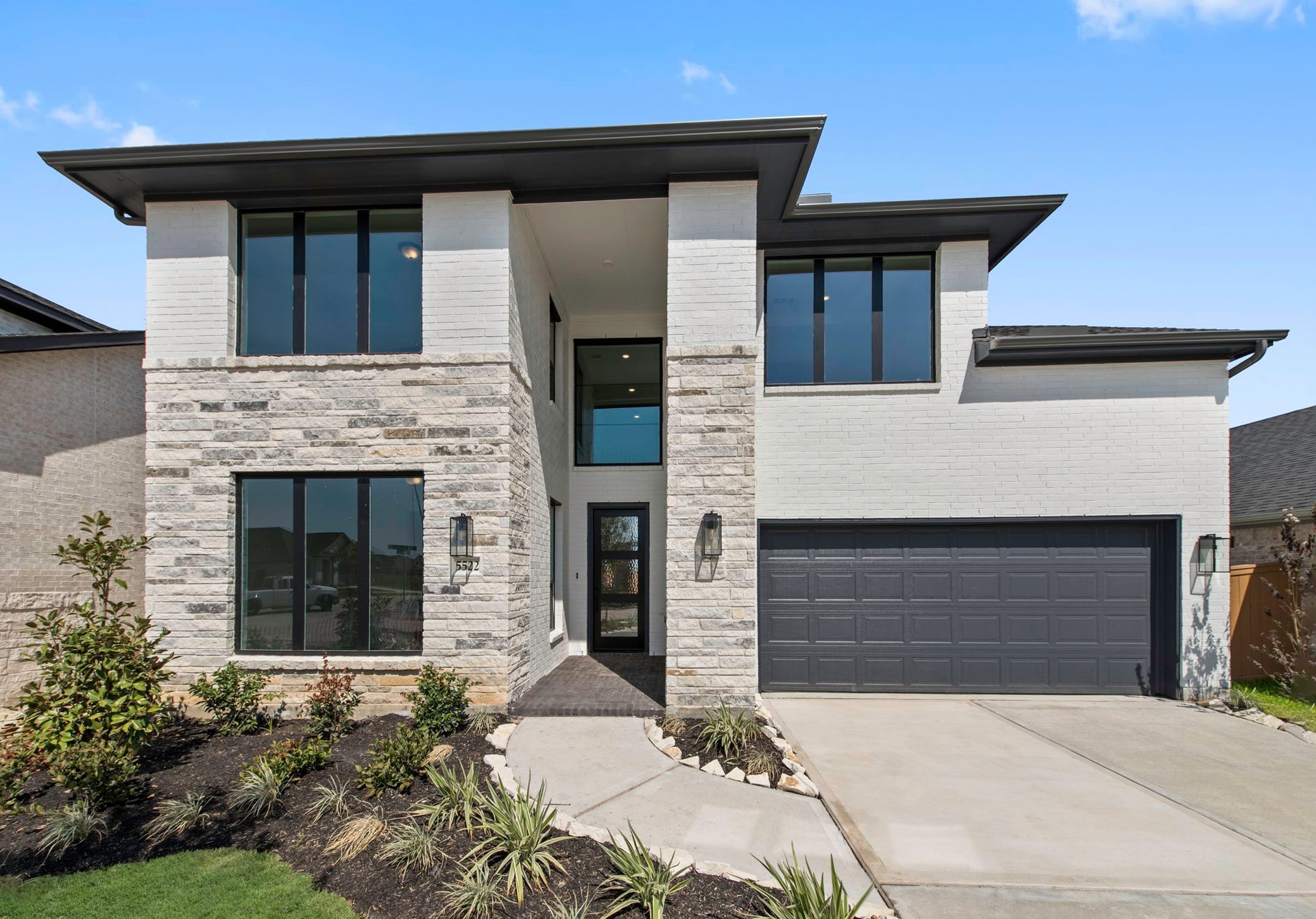 5522 Bermuda Sands Drive, Katy, TX 77493 Move-In Ready! Westin Homes | Maxwell II New Construction. Grass is digitally enhanced.