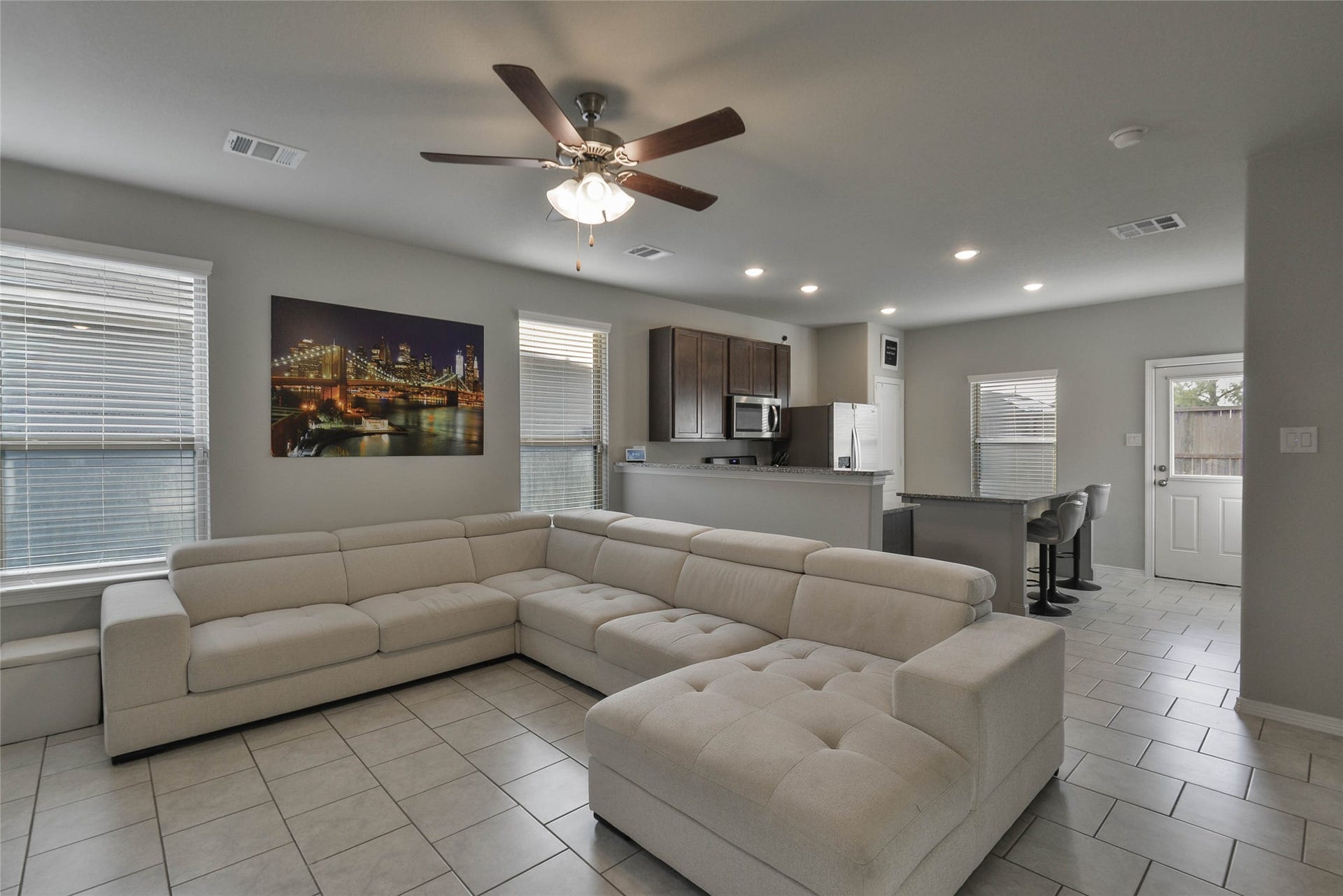 20024 Tuft Canyon Court, Porter, TX 77365 WALK into a spacious Living room overlooking the Kitchen with Tile flooring throughout !