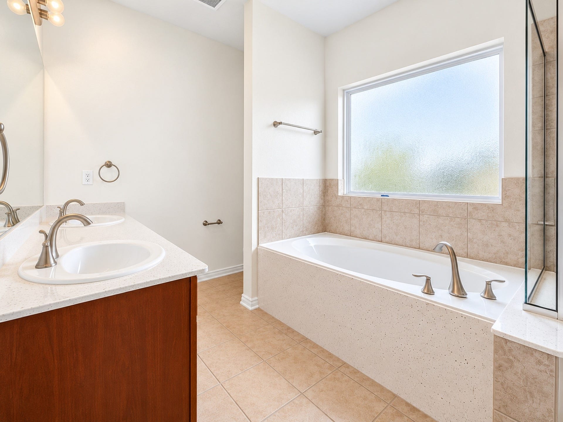 1902 Willow Ridge Lane, Fulshear, TX 77423 Bathroom view featuring a soaking tub, separate shower, vanity, and large window.