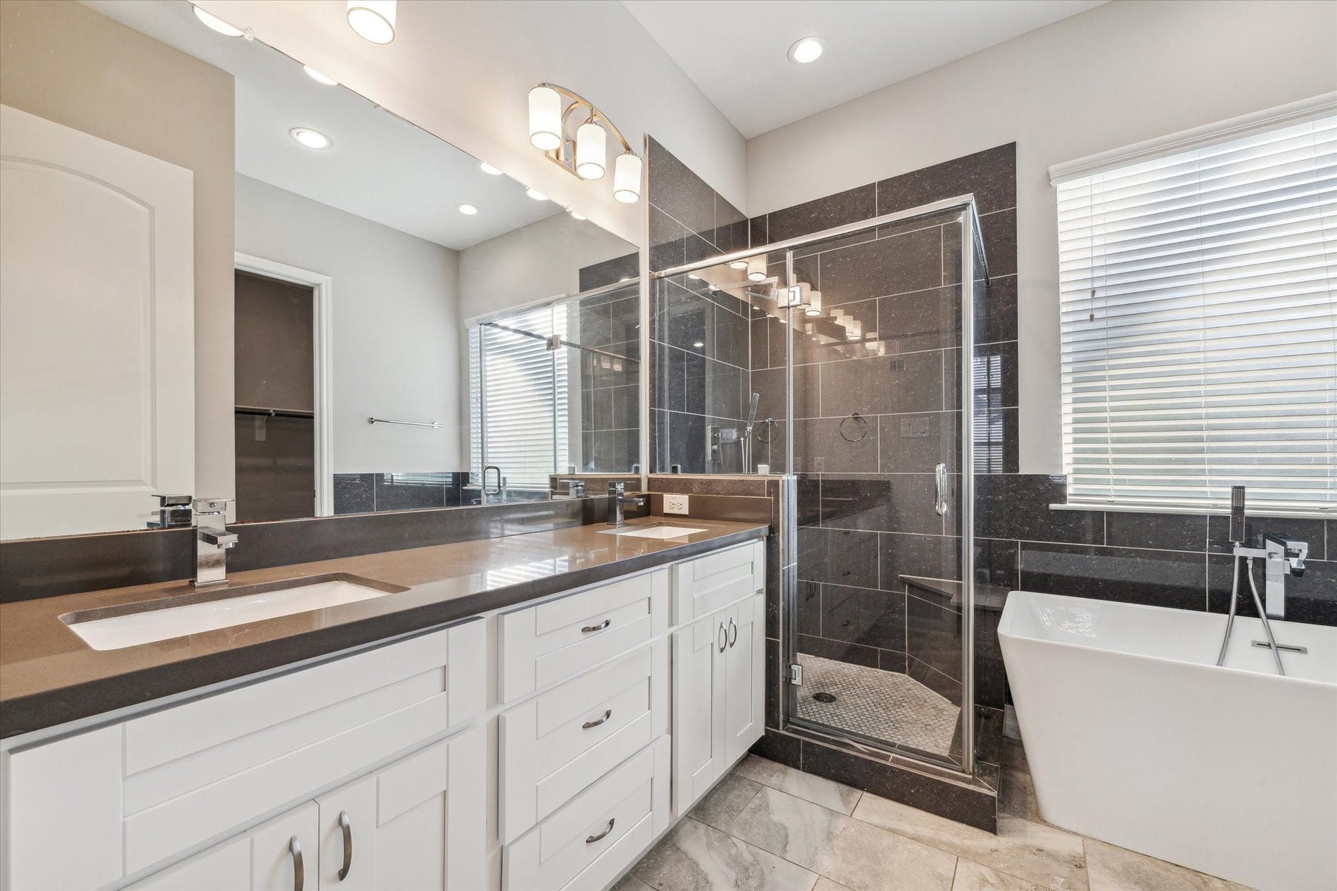 5610 Patrick Street, #A, Houston, TX 77076 Ensuite master bathroom, double vanity, separate shower and floating tub