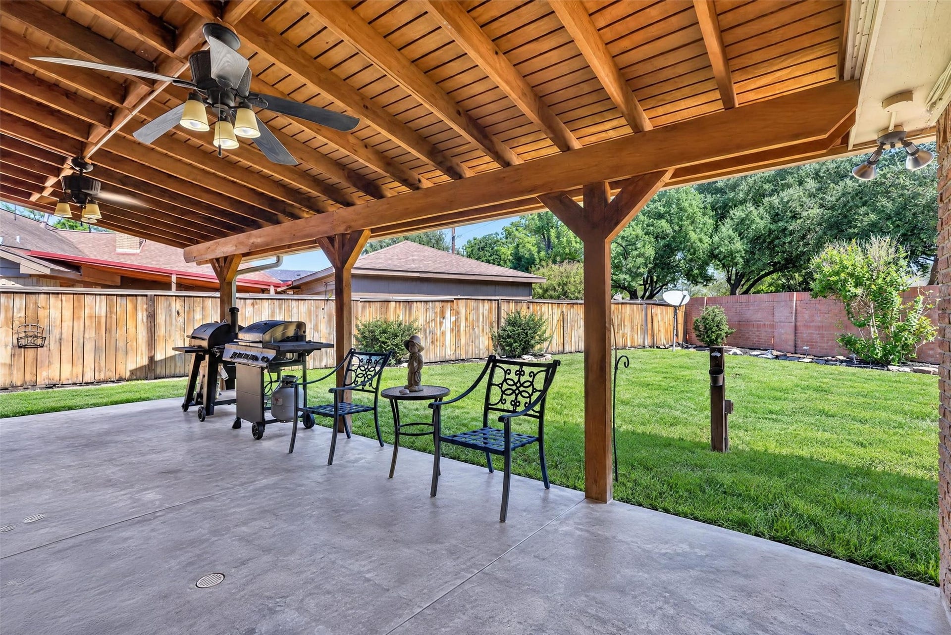 Covered back patio. Large backyard
