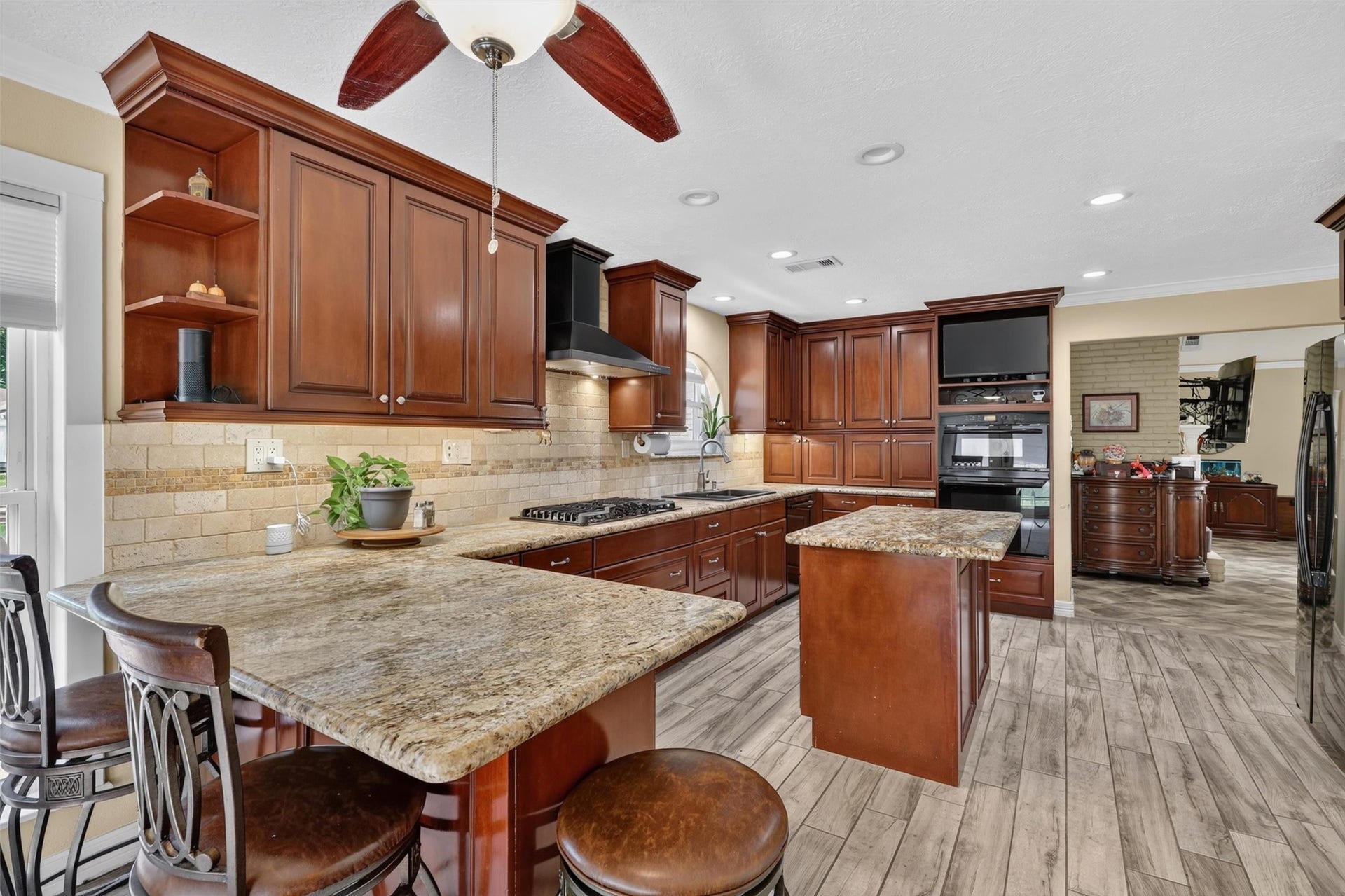 Kitchen with beautiful kitchen cabinets with undermount lights