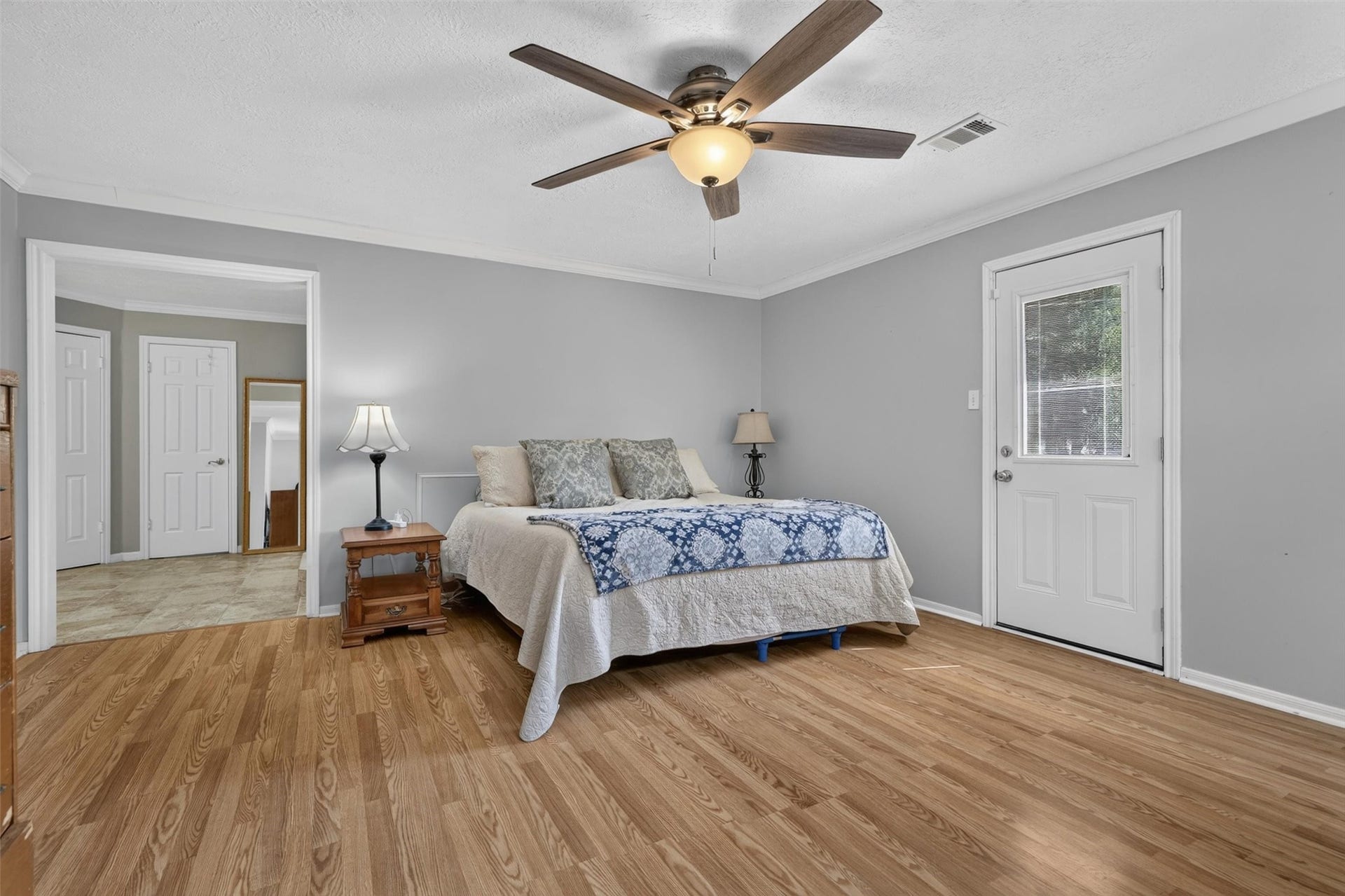 Primary bedroom with entry to primary bath