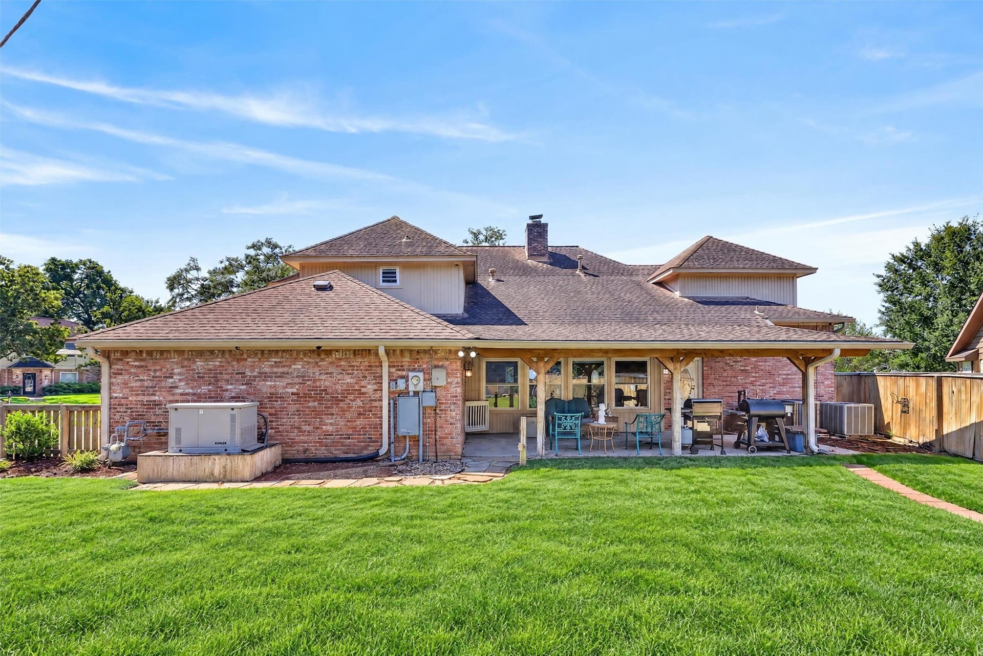 Back of house showing covered patio