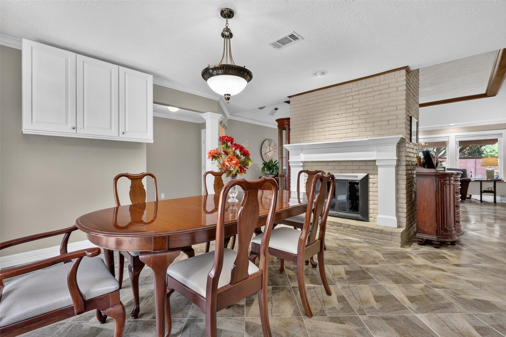 Formal dining room with fireplace