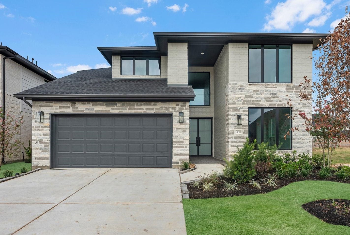 18811 Jade Grove Street, Hockley, TX 77447 Move in Ready. Westin Homes *New Construction* Maxwell III plan. Grass is digitally enhanced.