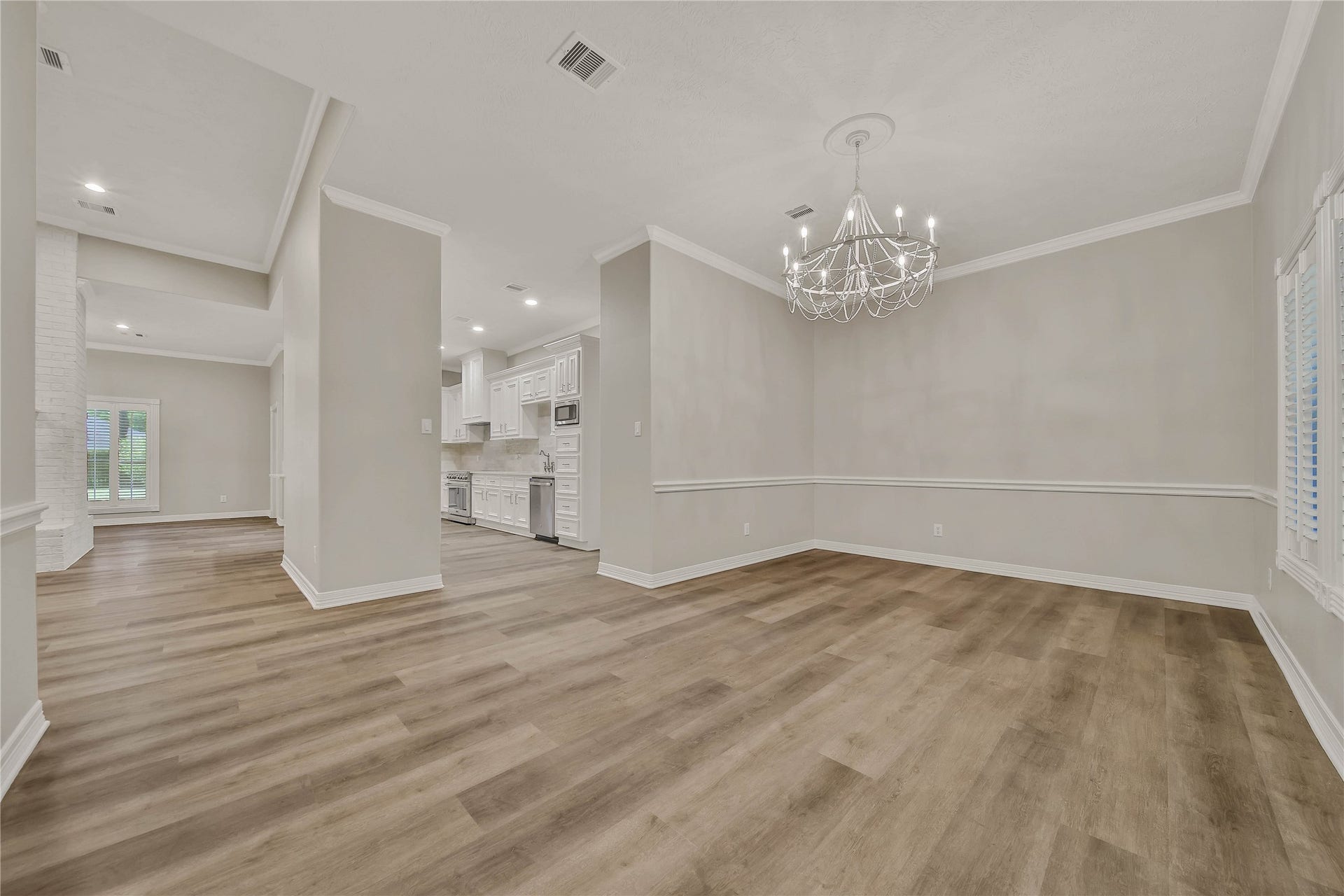 1125 W Stroker Road, #1125, Crosby, TX 77532 At front door looking into formal dining, kitchen and living area.