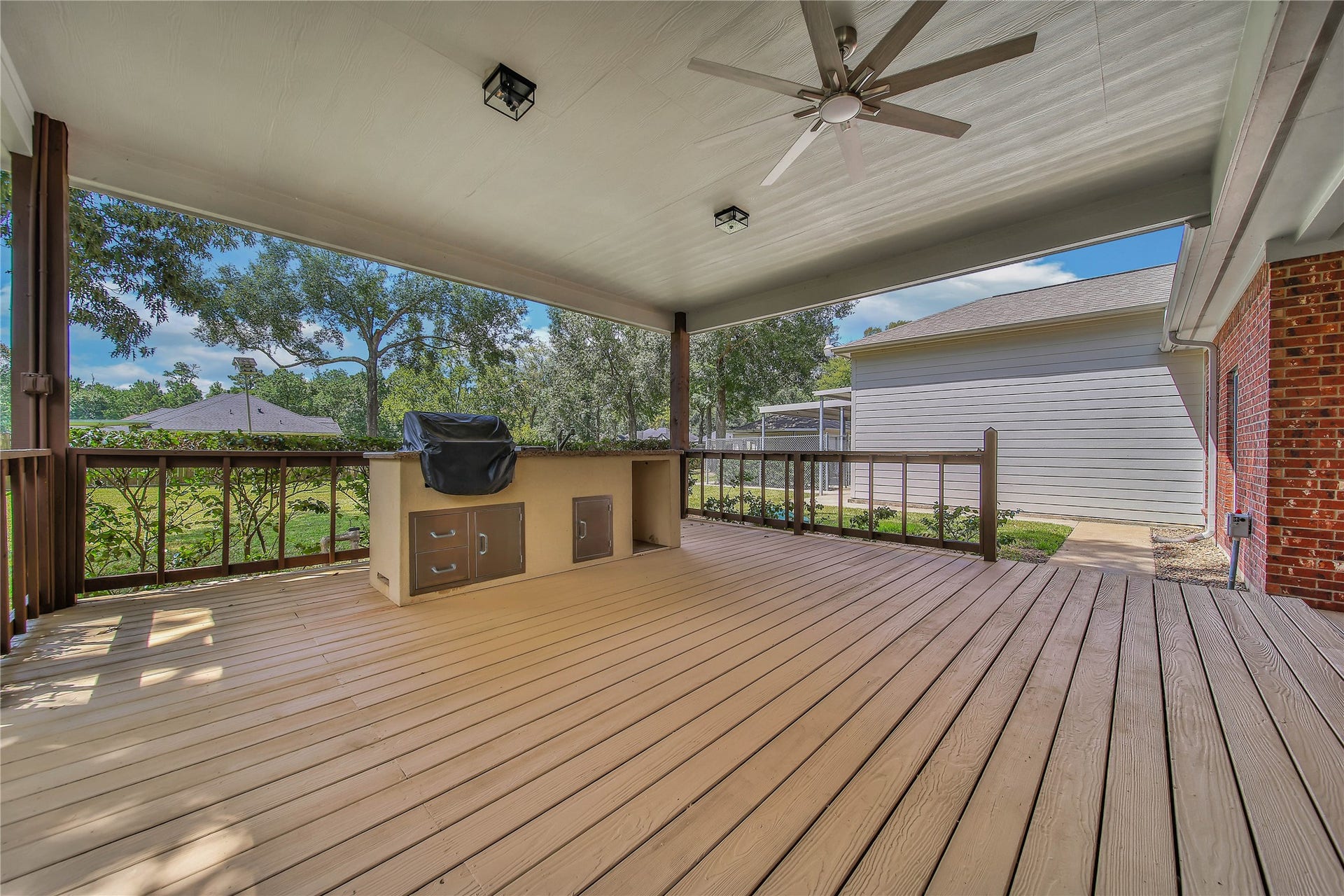 1125 W Stroker Road, #1125, Crosby, TX 77532 Covered entertainment area in backyard.