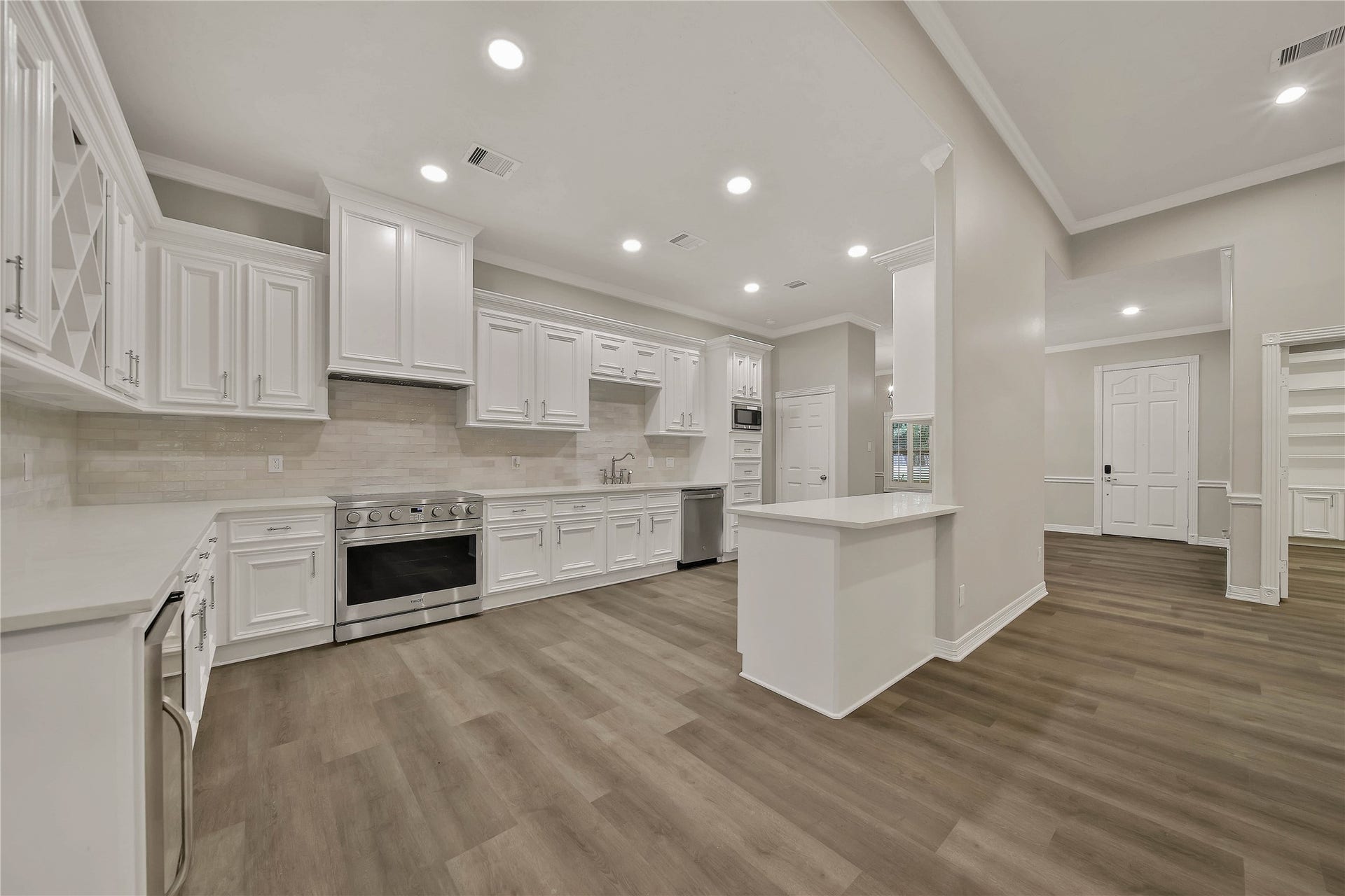1125 W Stroker Road, #1125, Crosby, TX 77532 Open concept! Custom cabinets and 36" range.