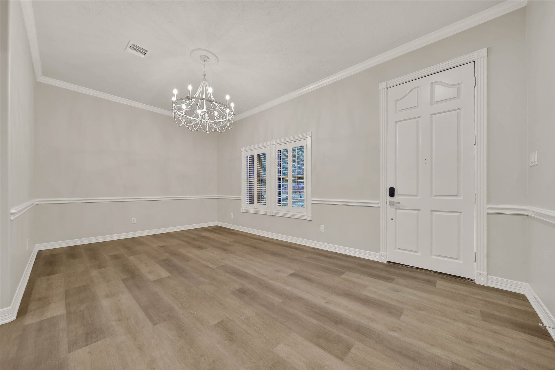 1125 W Stroker Road, #1125, Crosby, TX 77532 Formal dining room and front door.
