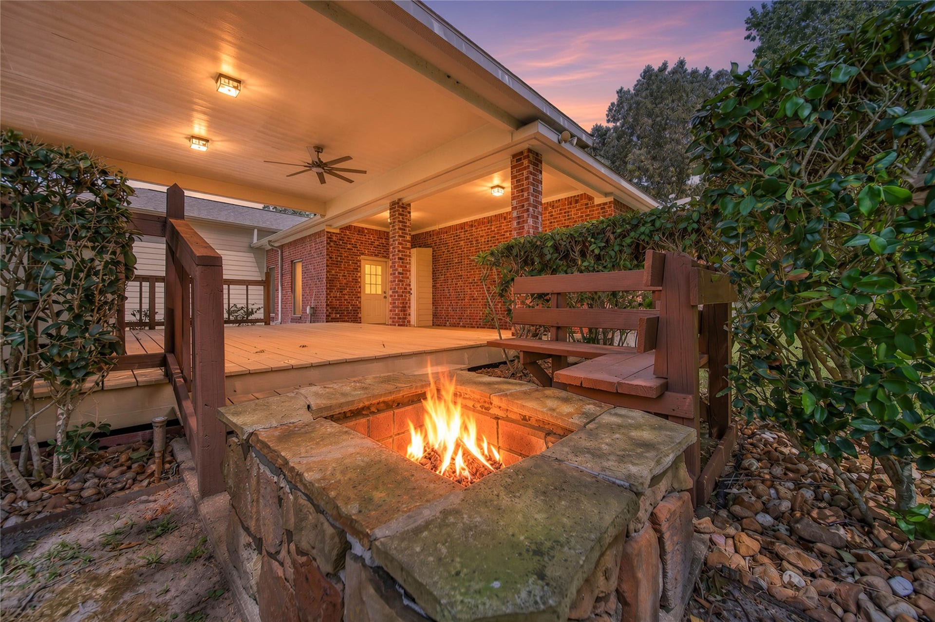 1125 W Stroker Road, #1125, Crosby, TX 77532 Built in firepit off of covered area in back yard.