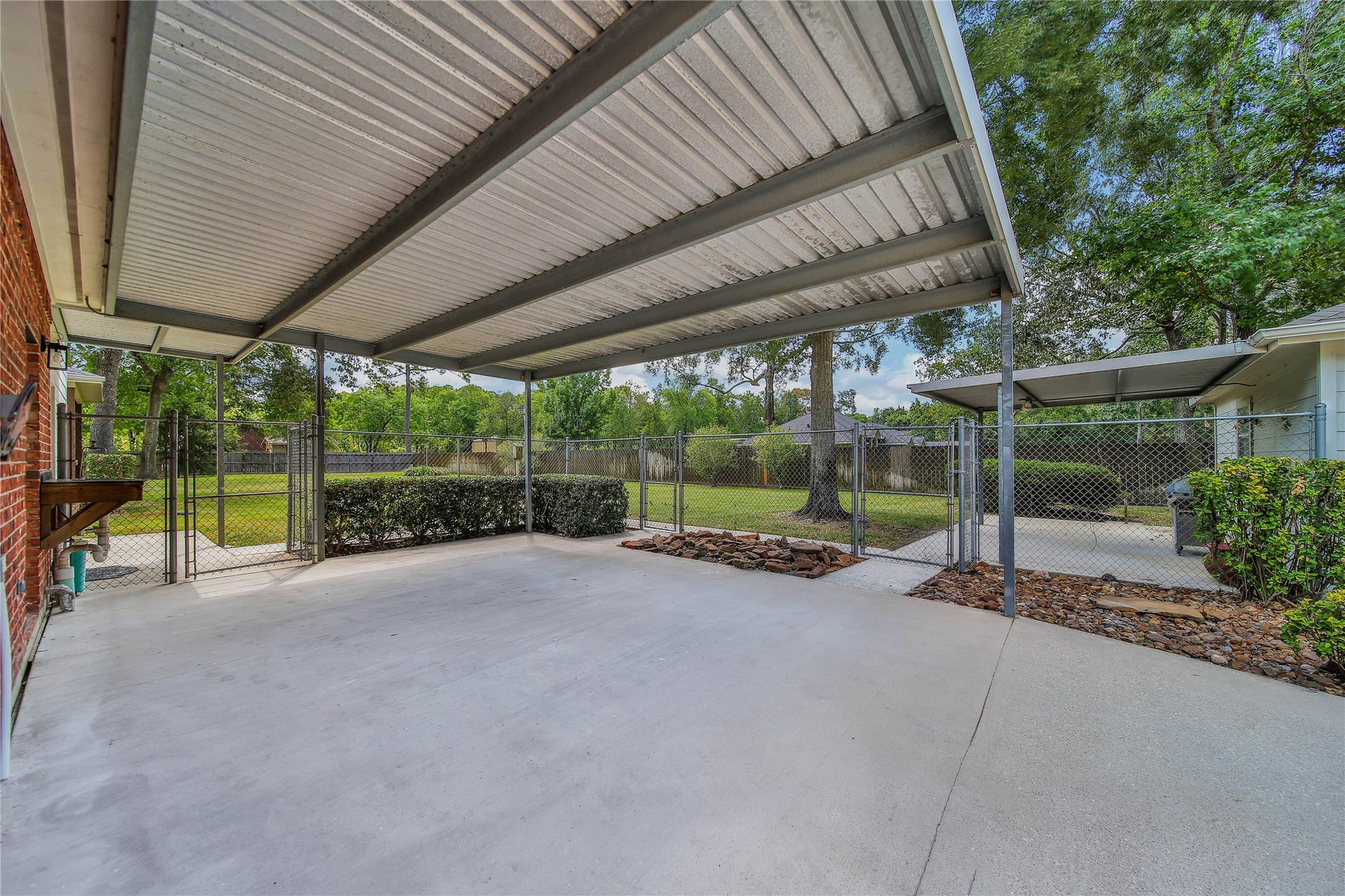 1125 W Stroker Road, #1125, Crosby, TX 77532 Covered area off of detached garage.