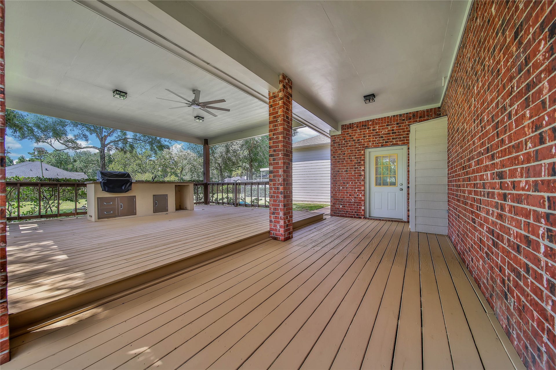 1125 W Stroker Road, #1125, Crosby, TX 77532 Covered entertainment area in back yard.