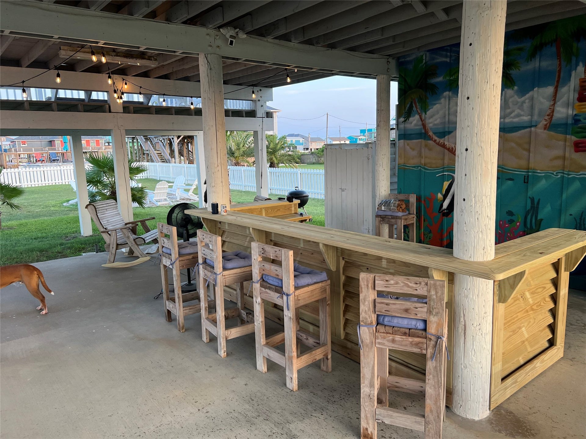 307 Angel Wing Street, Surfside Beach, TX 77541 Whether you are grilling, having a drink at the bar or hanging around the firepit, this is the ultimate space to relax and make unforgettable memories!