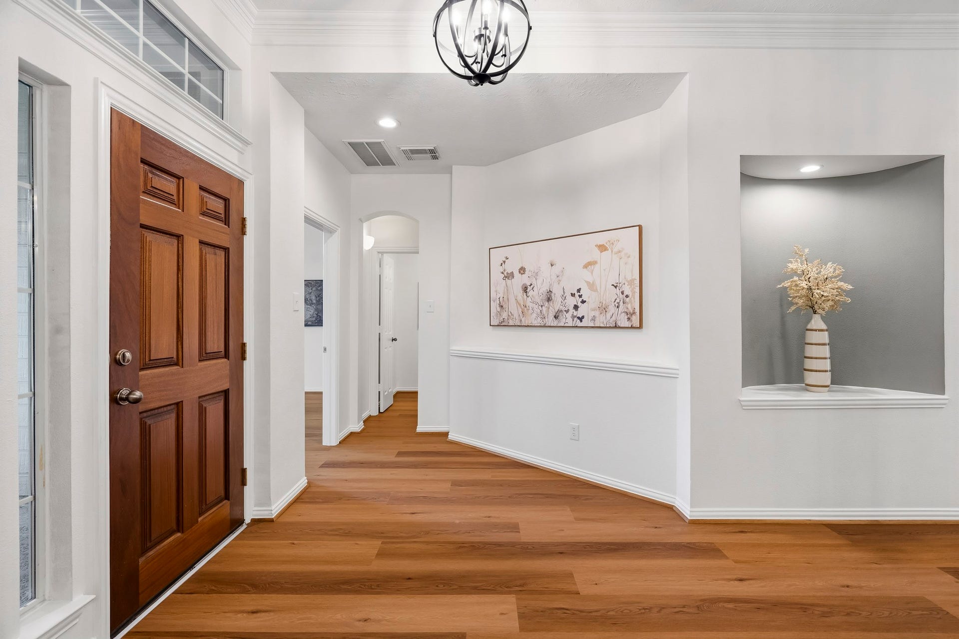 5202 Bessies Creek Trace, Fulshear, TX 77441 Extending from the Foyer, this thoughtfully designed hallway leads to the Study and Powder Room. A discreetly integrated coat closet enhances functionality by providing convenient storage for coats, shoes, and other household necessities.