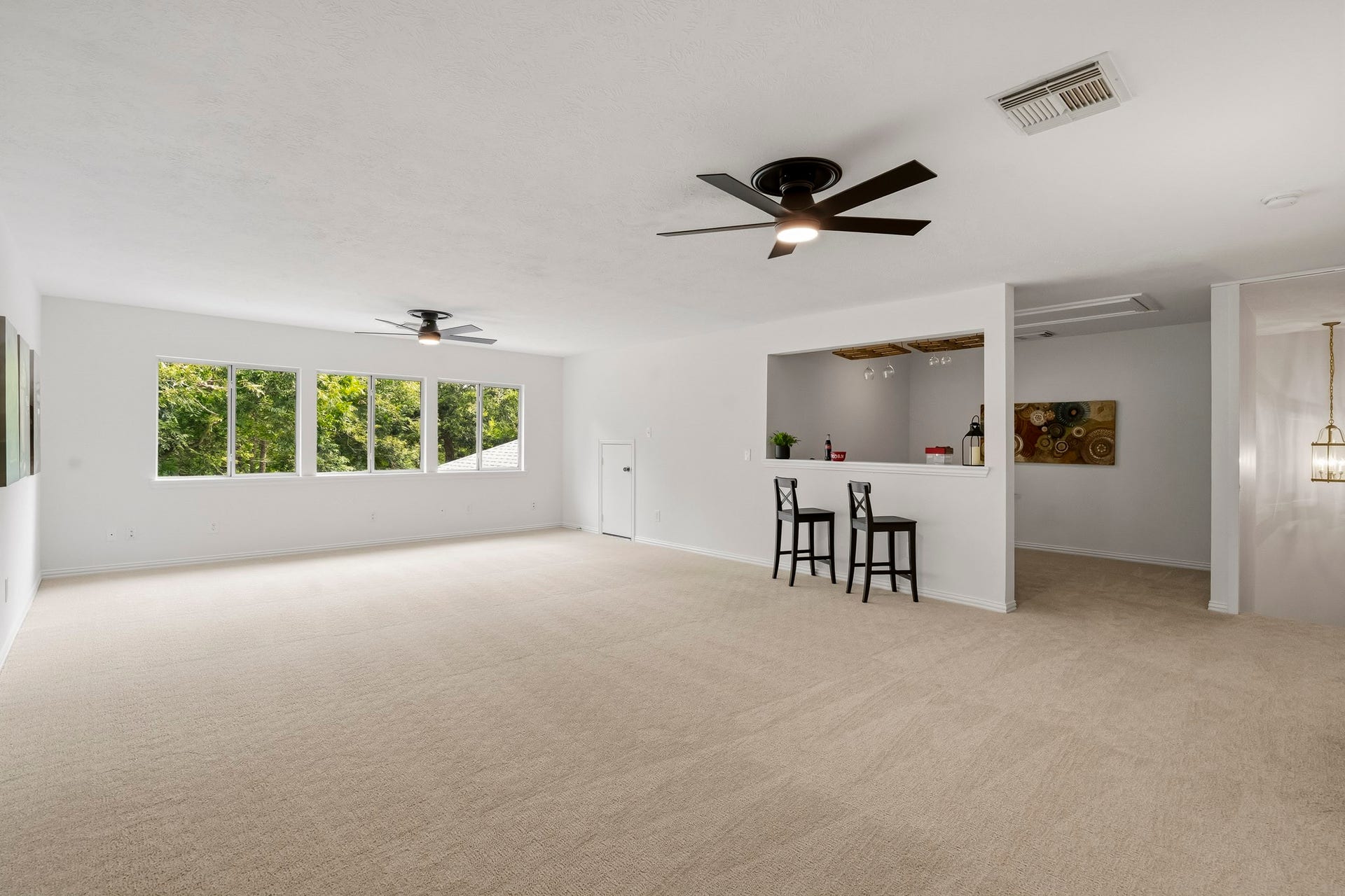 5202 Bessies Creek Trace, Fulshear, TX 77441 This upstairs Game Room is designed for making memories, whether you're settling in for movie night, challenging friends to a game of pool, or constructing the next record-breaking block tower.