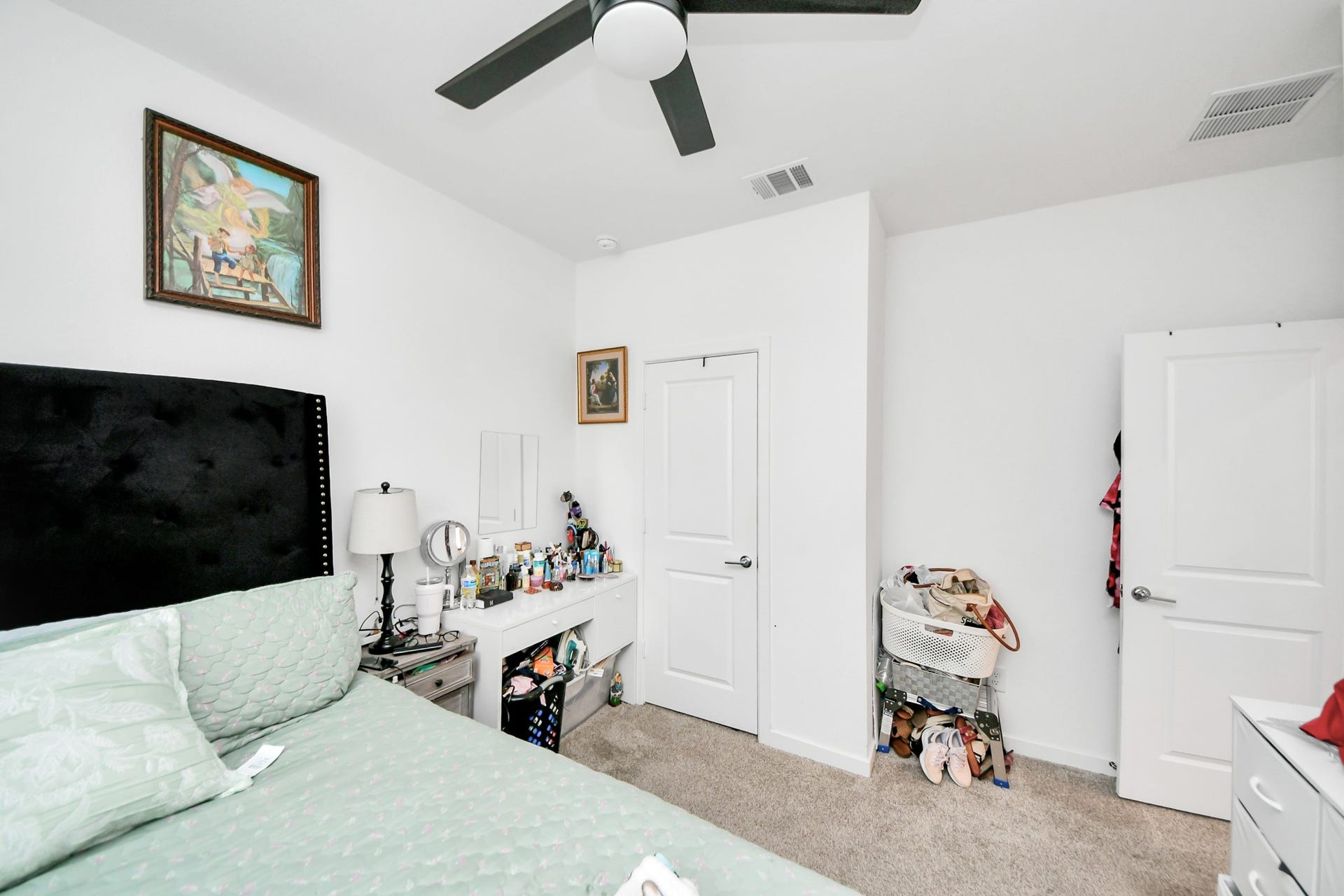 Bedroom 4 of 4 with ceiling fan.