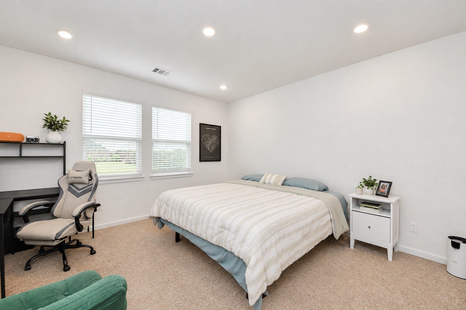 Large Primary bedroom with a lot of natural light.