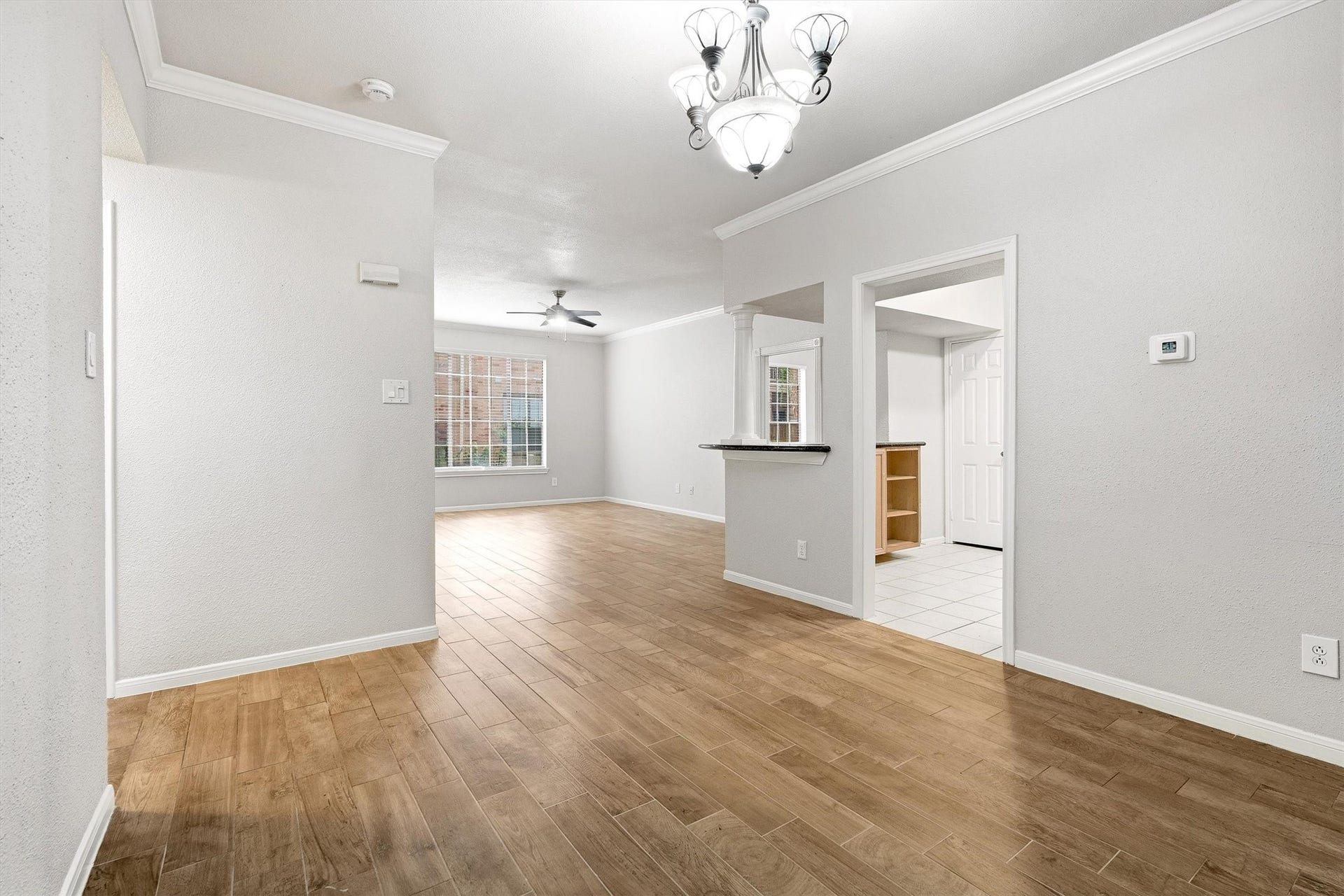 Wide-angle view of the dining and living areas, highlighting the condos comfortable open-concept flow.