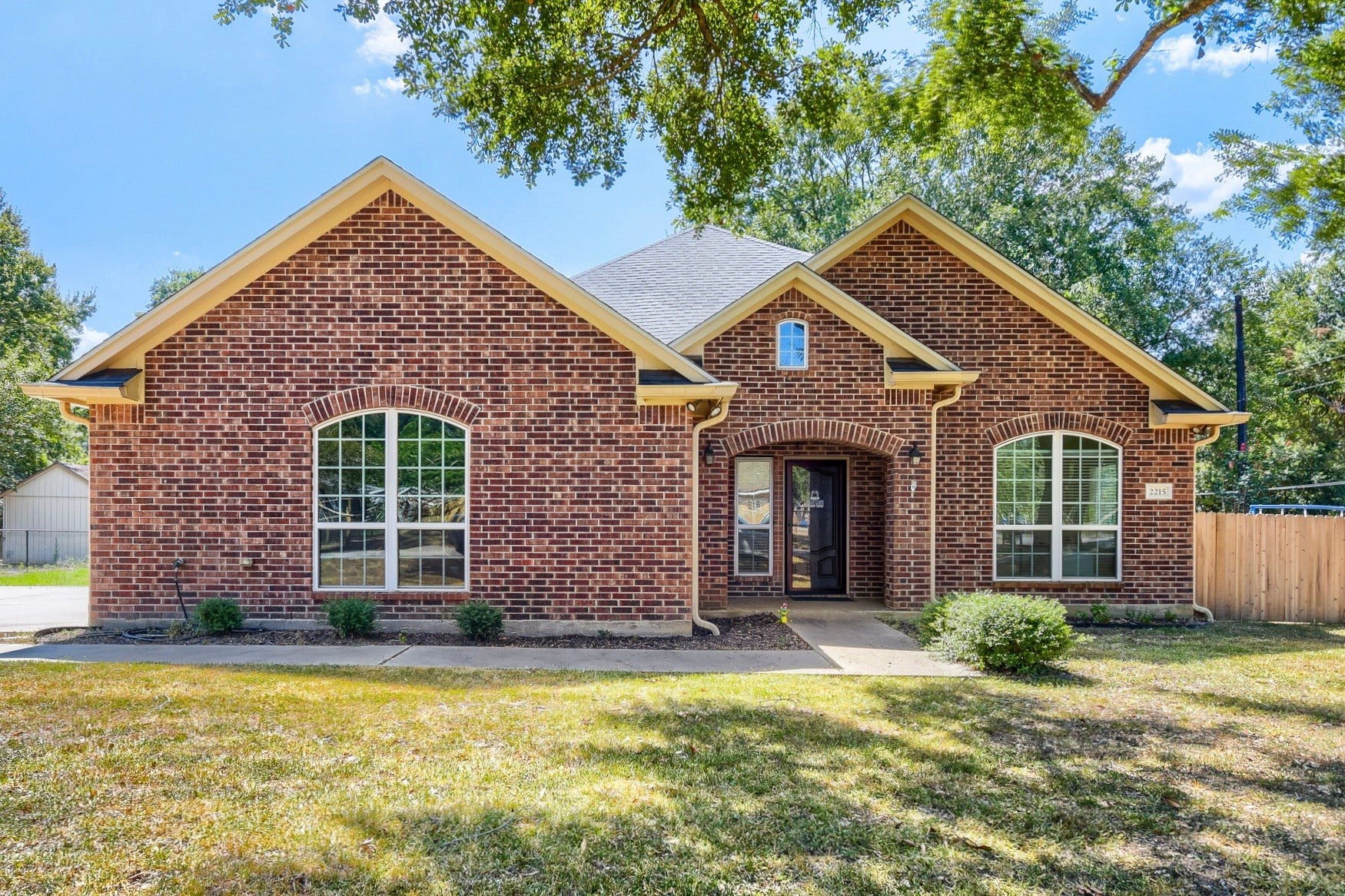 2215 Penick Road, Waller, TX 77484 Brick one-story home on over a 1/4 acre