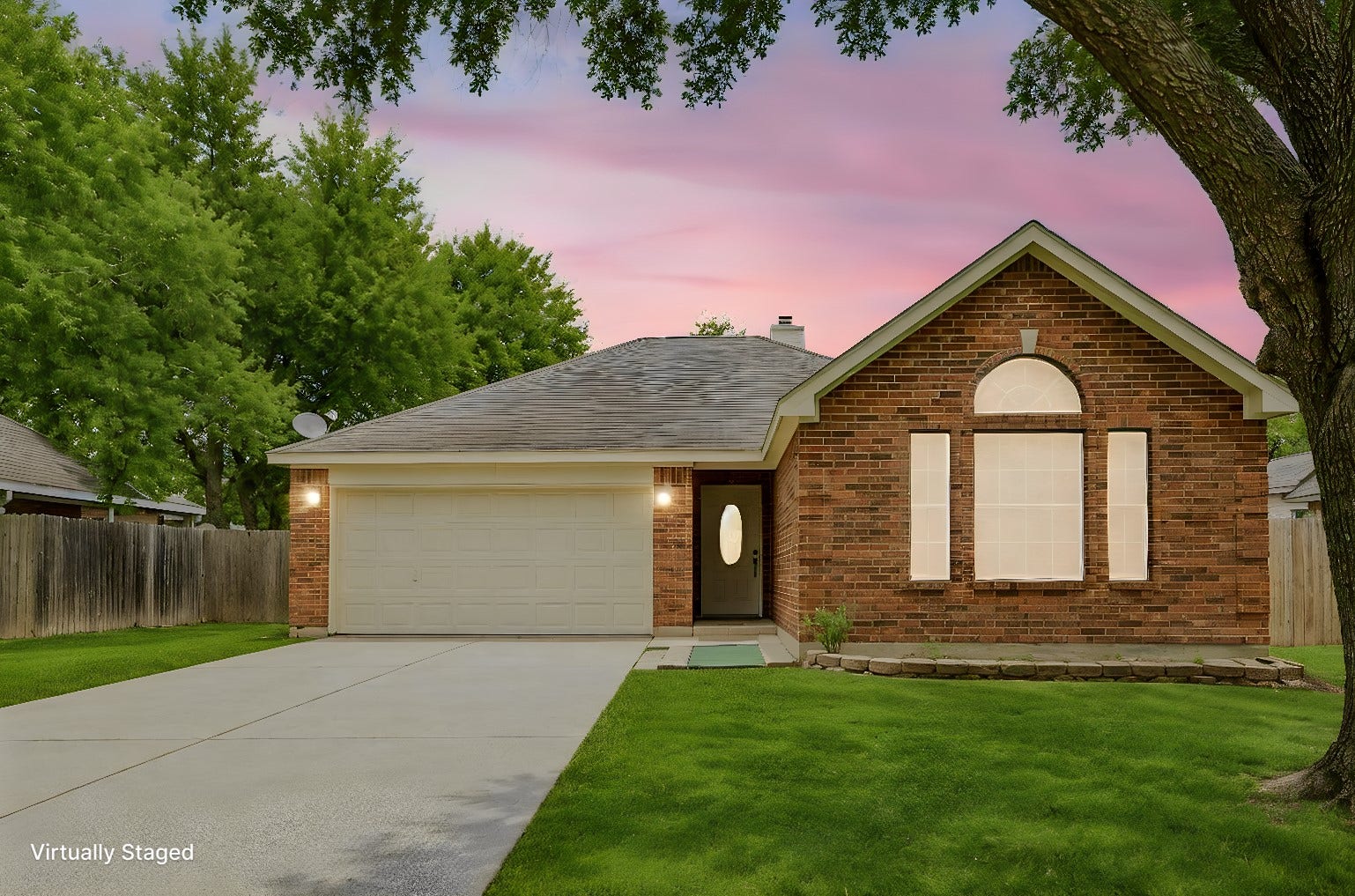 2512 Patna Drive, Katy, TX 77493 Charming brick home with a welcoming arched window, nestled in a serene neighborhood in Old Katy.