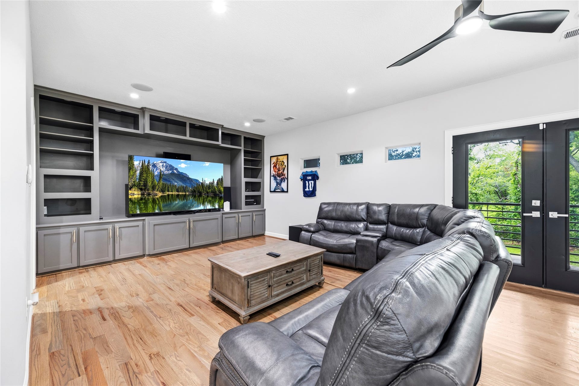 23 Westpoint Drive, Missouri City, TX 77459 Dedicated media lounge with custom built-ins and ample seating space for movie nights and game days.