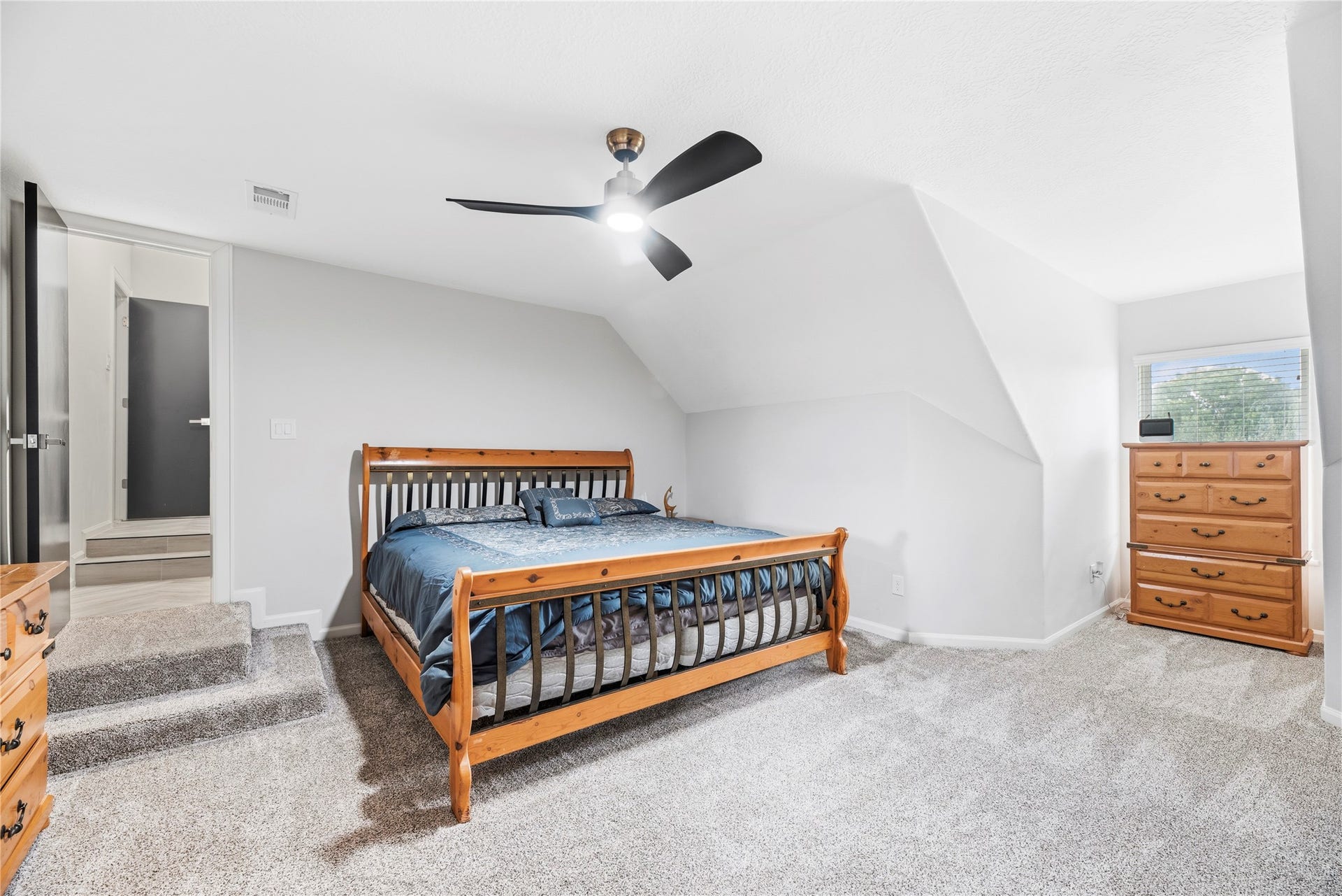 23 Westpoint Drive, Missouri City, TX 77459 Generous upper-level bedroom offering flexibility for guests, teens, or extended family.