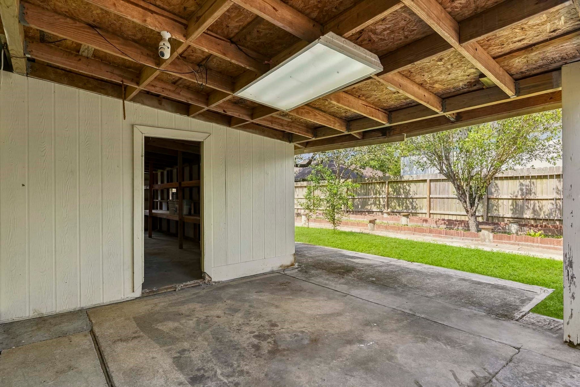 5815 Red River Drive, Dickinson, TX 77539 Backyard storage area