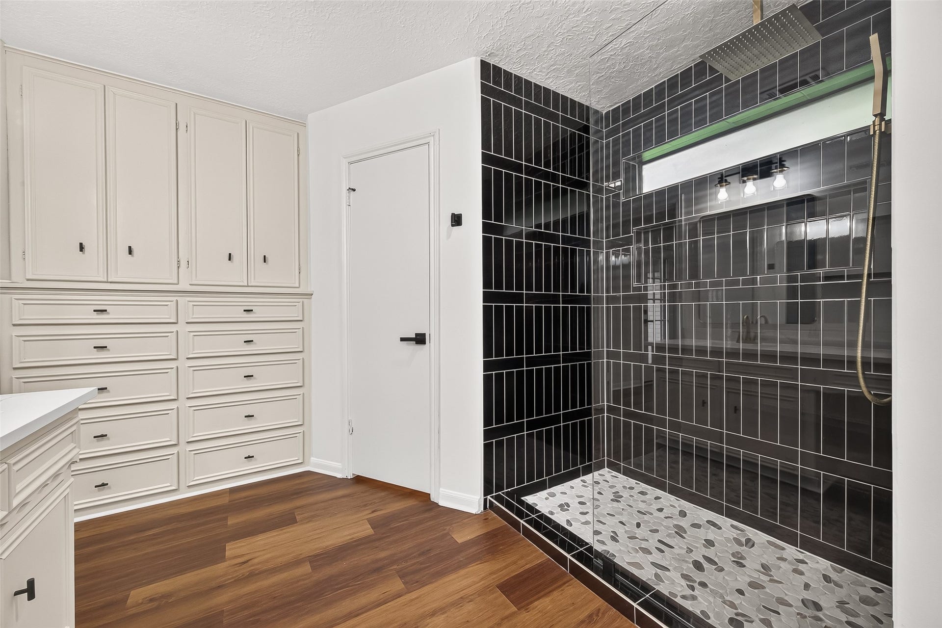 Modern primary bathroom offering a
luxurious rainfall shower head