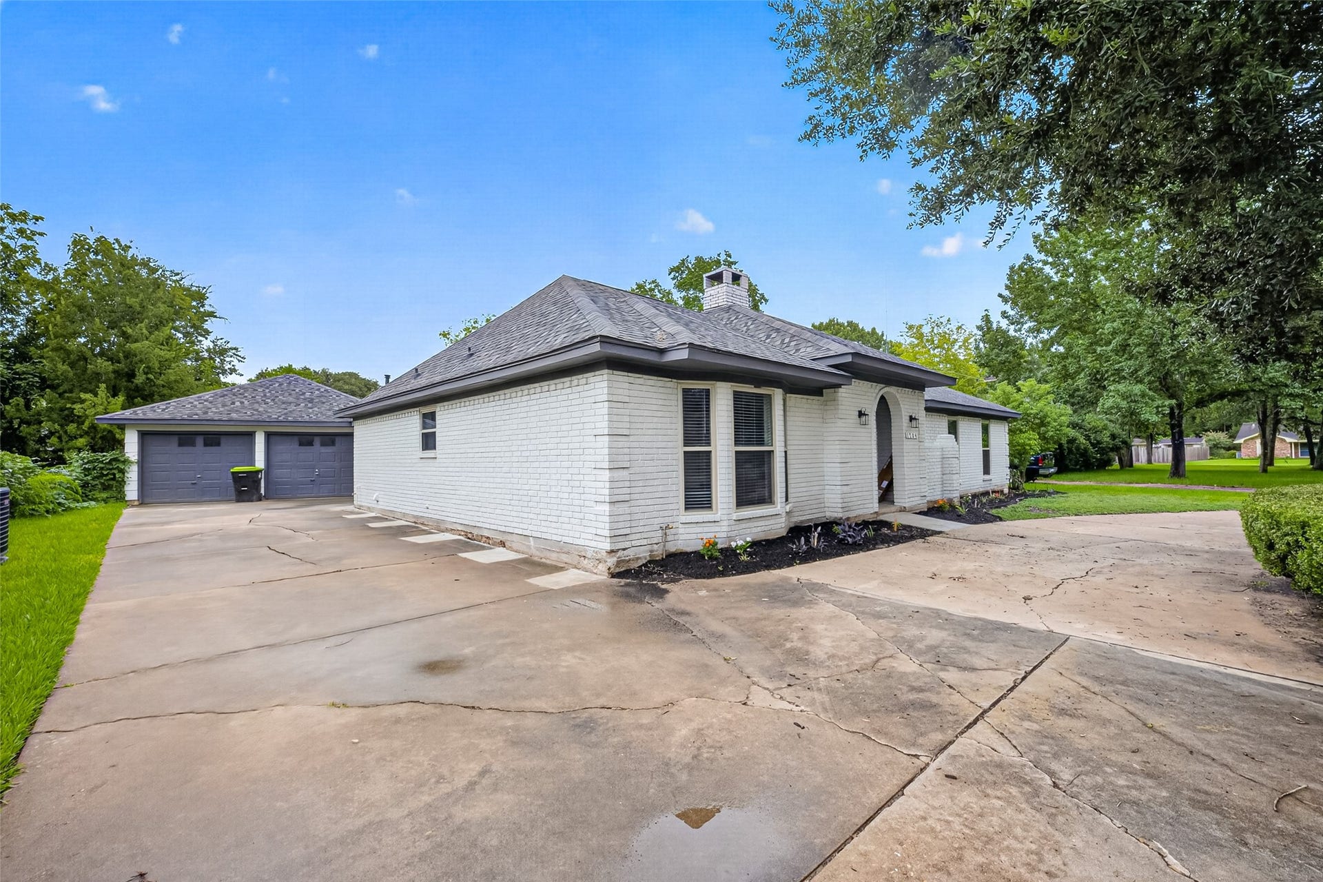 Expanded driveway offers
additional parking and easy access
to the detached garage