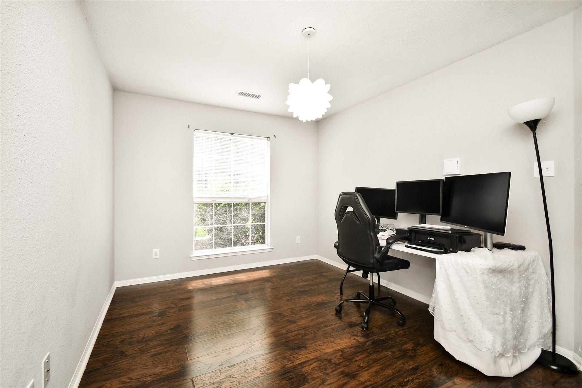 2319 Blue Reef Drive, Katy, TX 77449 Bright flex space with a large window, perfect for a home office, playroom, or additional bedroom.