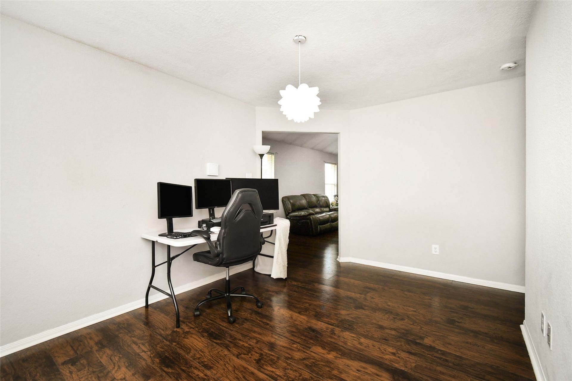 2319 Blue Reef Drive, Katy, TX 77449 Versatile flex room currently used as a home office, offering an open view into the living area.