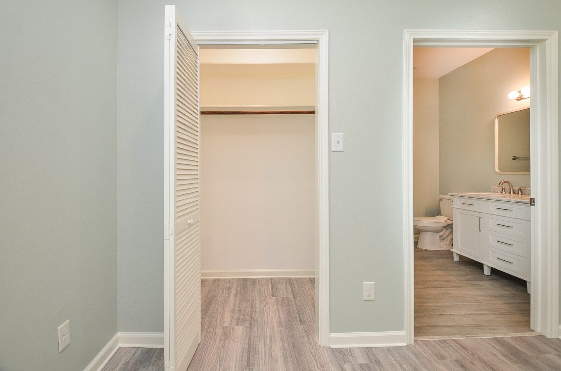 Wow. Your ensuite walk-in closet and bath are easily accessed from your primary bedroom.