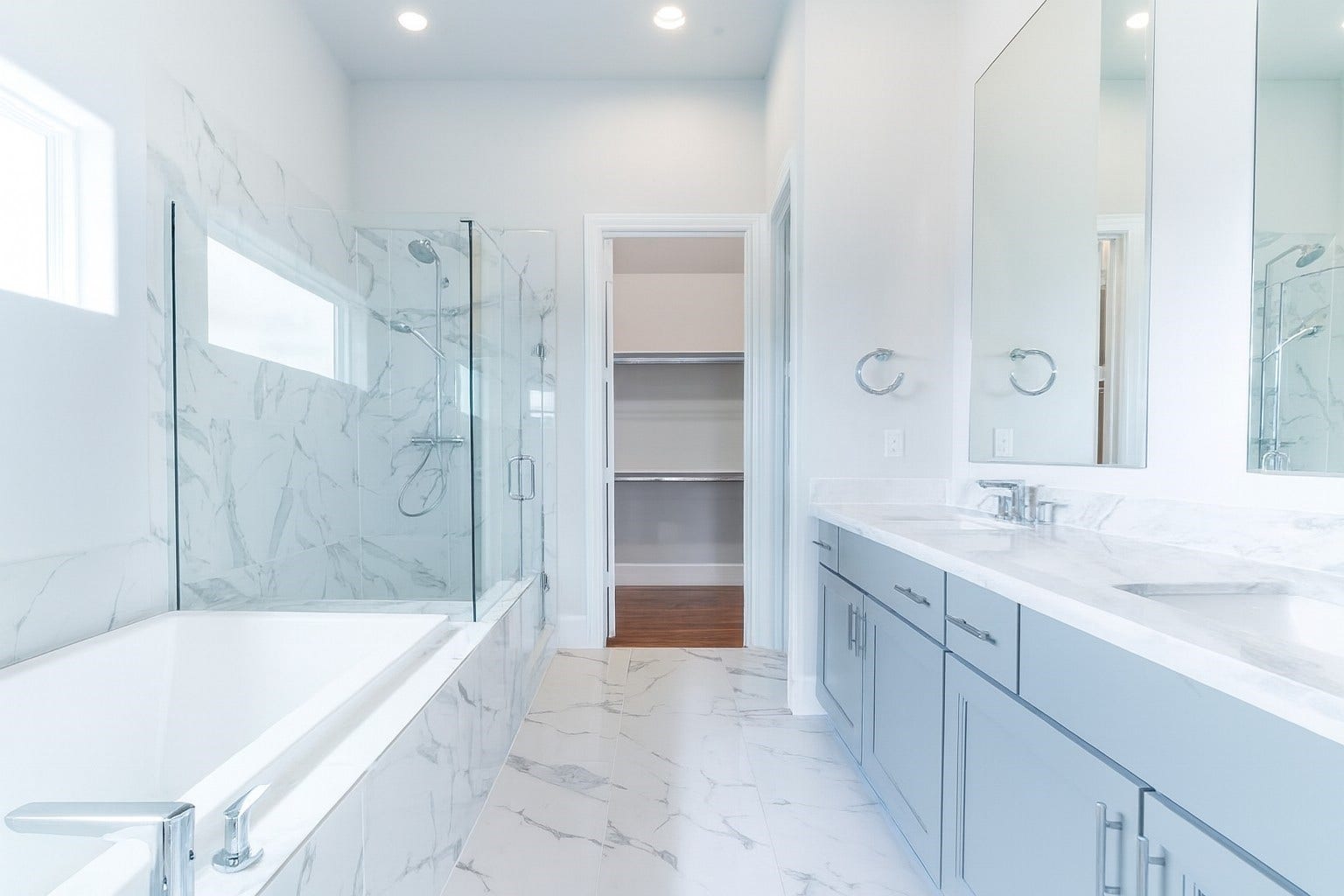 739 Bringhurst Street, Houston, TX 77020 Light and bright! Primary bath with nice tub and freestanding shower leading into 1 of 3 closets. Similar plan and finishes.