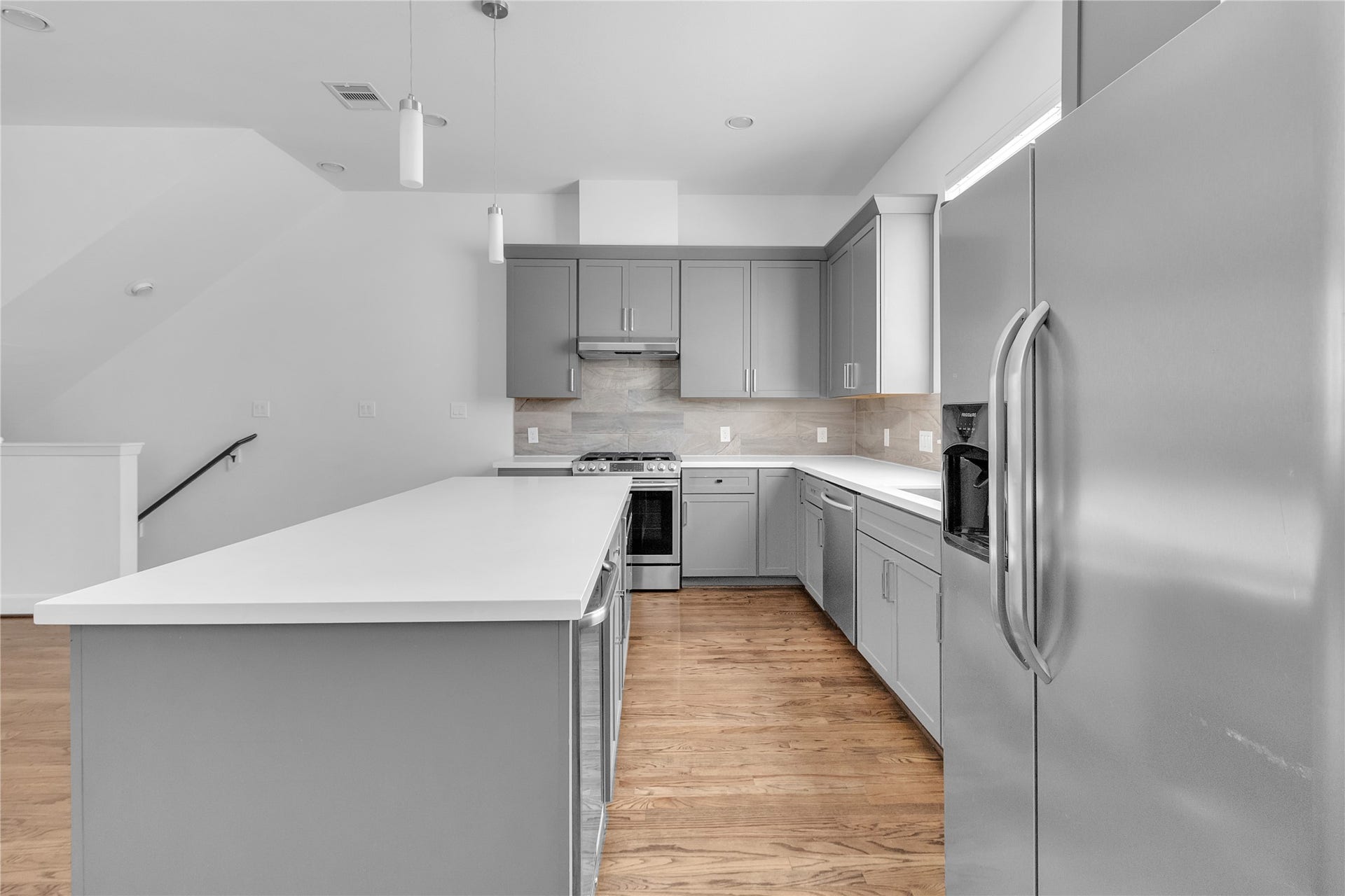 The kitchen is located on the second floor with an Open Concept Floor plan.