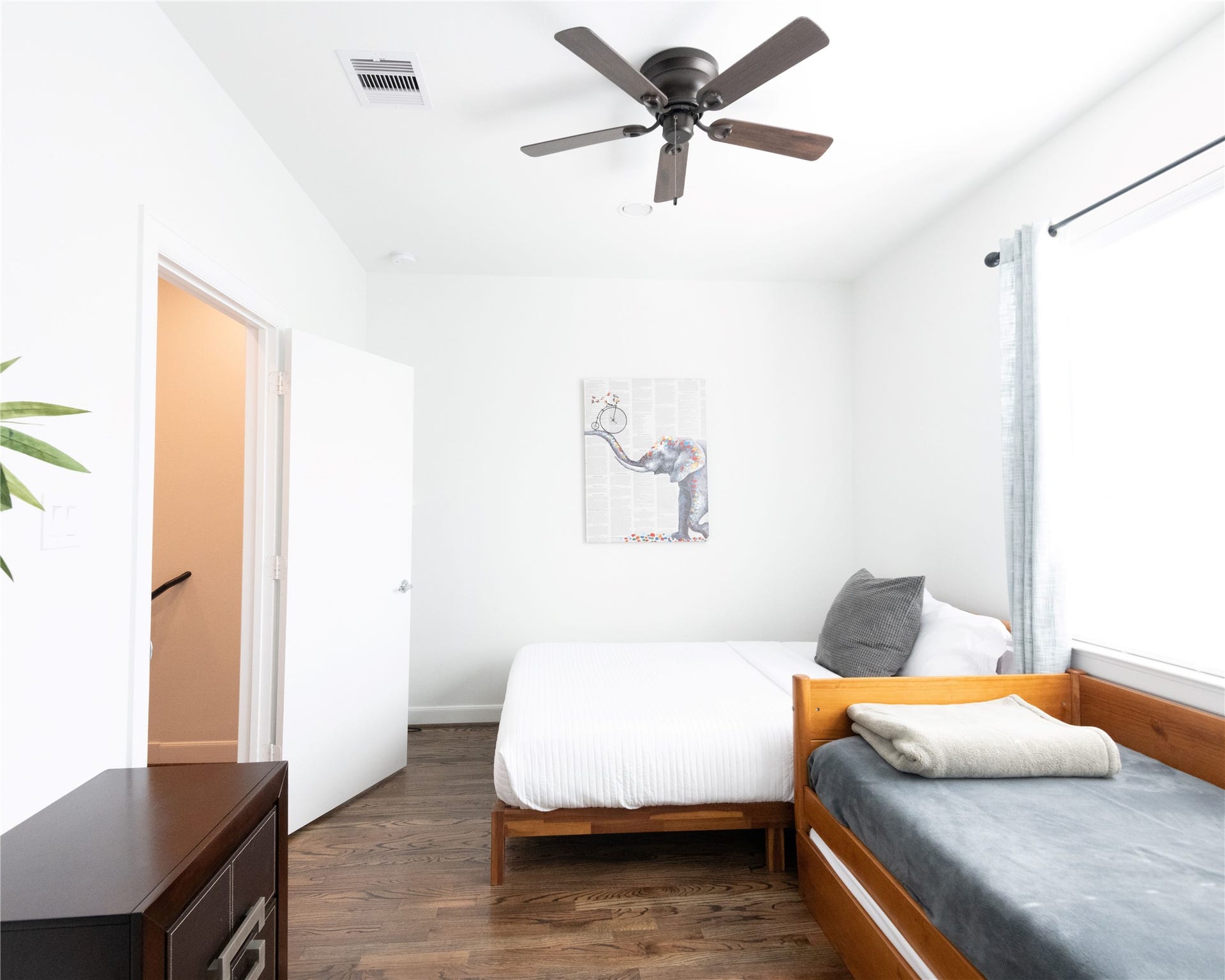 Bathroom located inside the 2nd bedroom- Amazing subway tile shower with plenty of space and closet.
