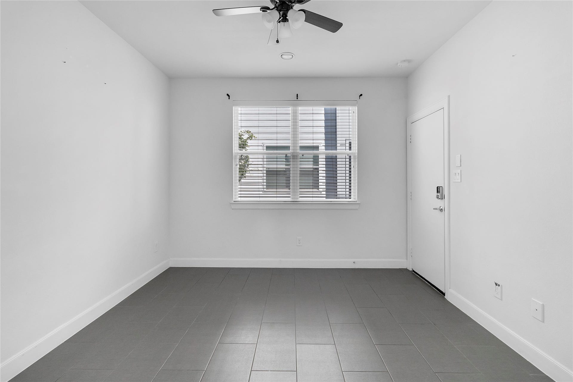 As you walk into the foyer on the right you are welcome by the first bedroom.