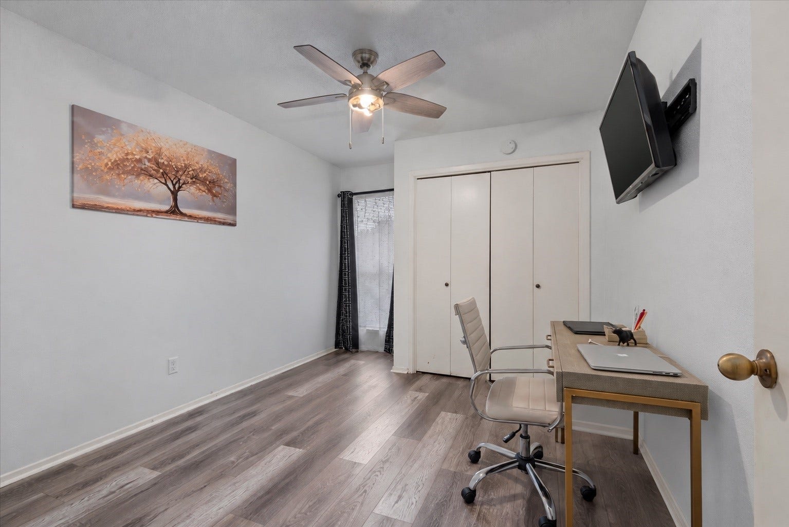 9522 Wellsworth Drive, Houston, TX 77083 Flexible bedroom with wood-look floors, ready to be a guest room or home office