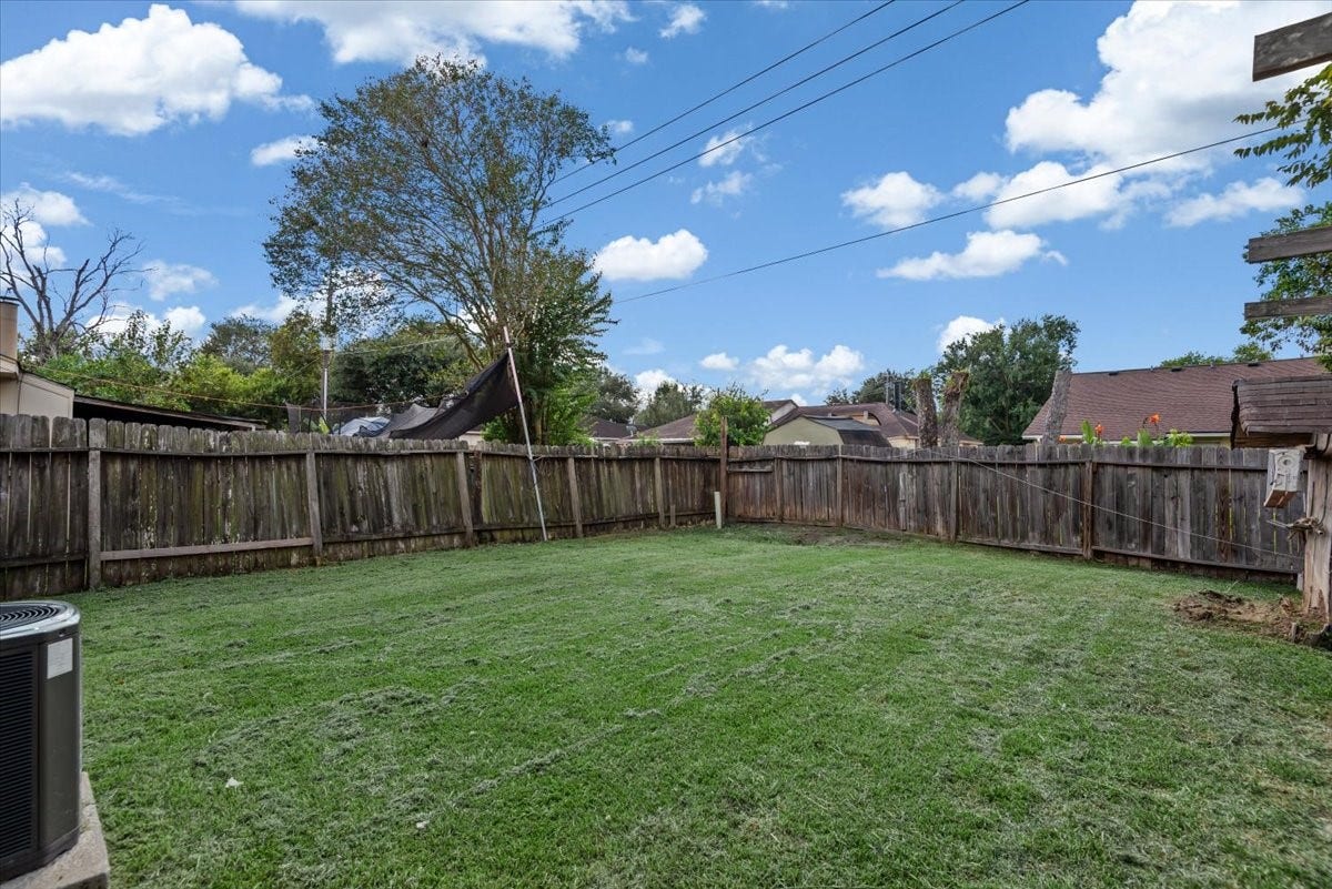 9522 Wellsworth Drive, Houston, TX 77083 Huge fenced backyard with endless room for play, pets, or gardening