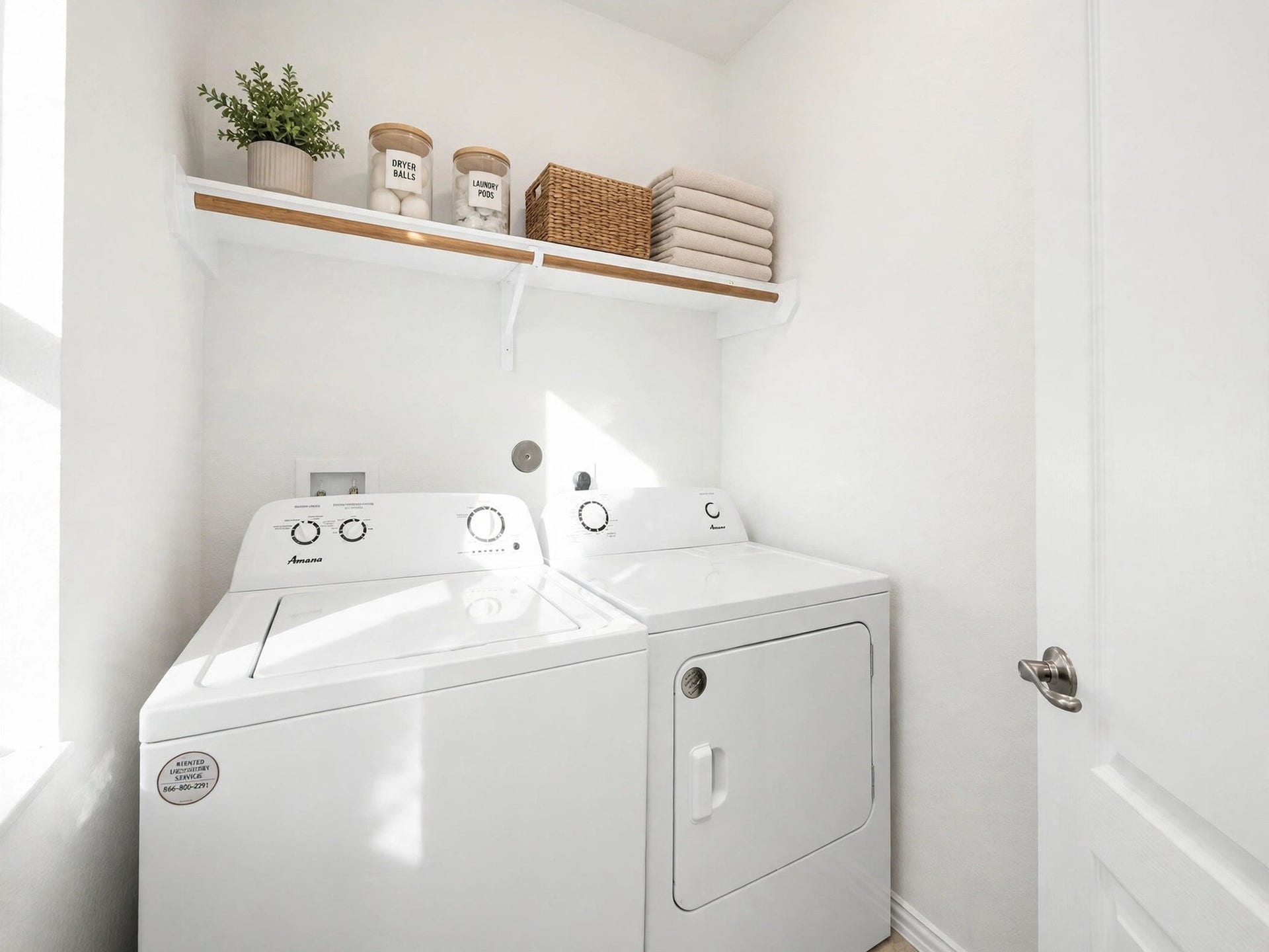 1902 Willow Ridge Ln, Fulshear, TX 77423 Dedicated laundry room with washer and dryer connections and overhead shelving.