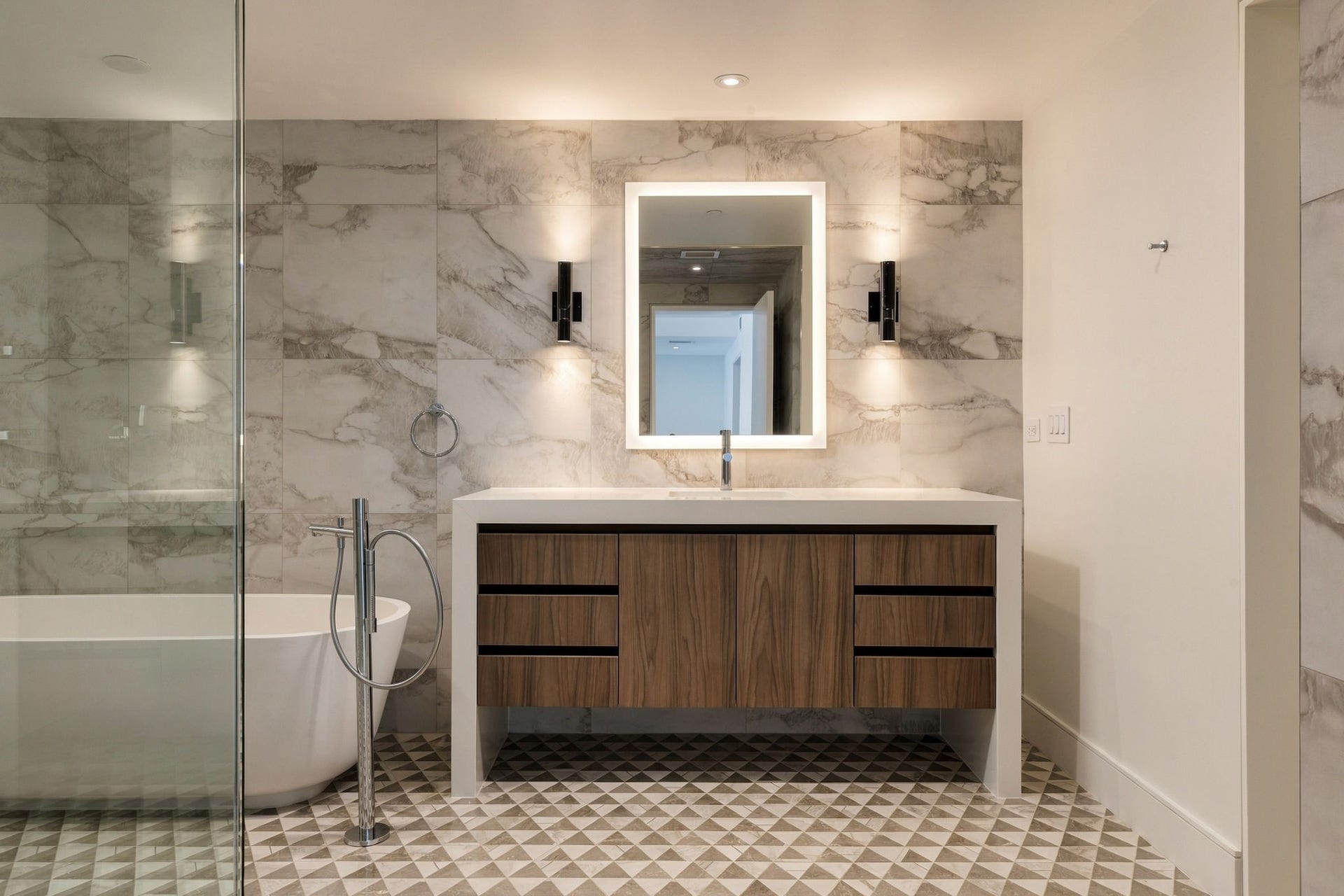 2nd floor primary bath vanity and tub.