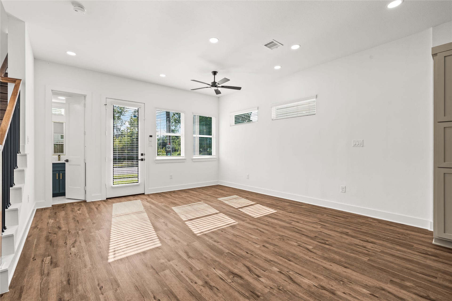 4702 Rawley Street, Houston, TX 77020 Sun-drenched afternoons await. Striking linear shadows filter through the windows, emphasizing the impressive footprint of the main level.